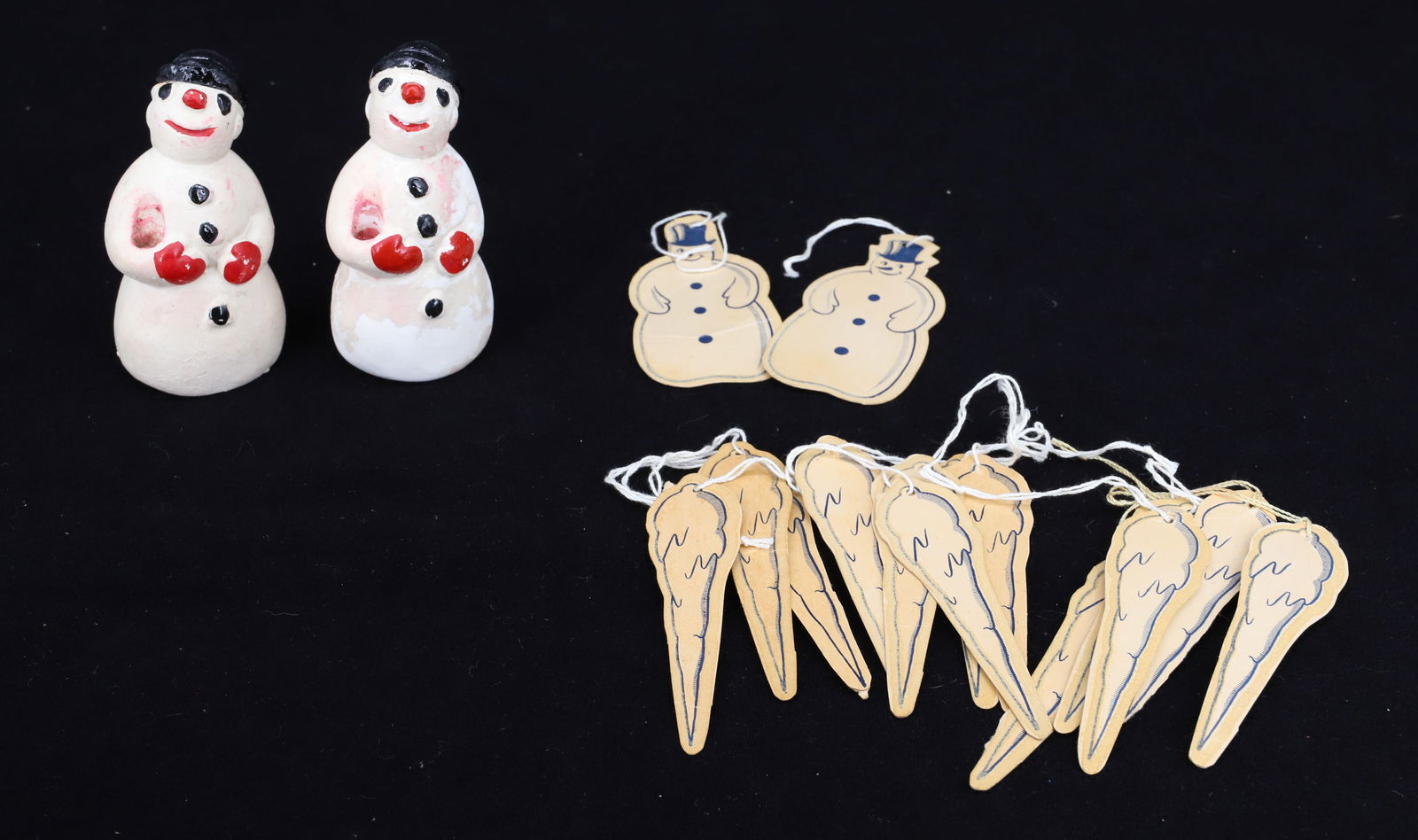 PAIR OF PLASTER SNOWMEN CANDLEHOLDERS AND TAGS: SNOWMEN 3 3/4" H. MULTIPLE SNOWMEN AND ICICLE PAPER TAGS. PLEASE READ CAREFULLY - THIS IS AN ONLINE ONLY AUCTION -Terms for Purchasing and Shipping of Auction Items. Please read carefully before biddi