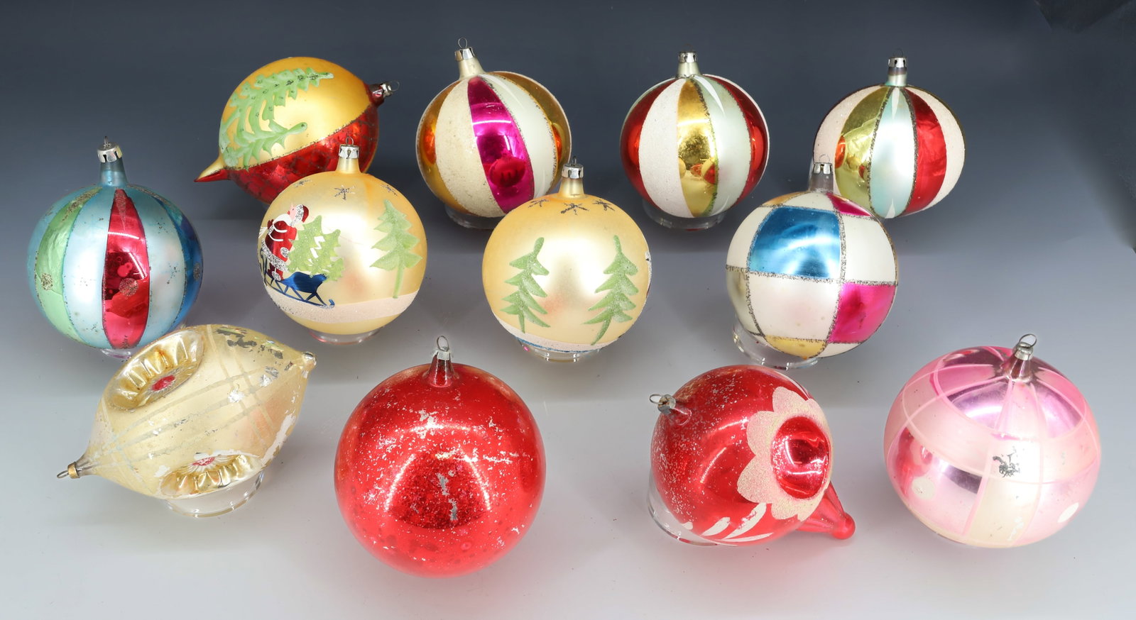 LOT OF (12) JUMBO SIZE GLASS CHRISTMAS ORNAMENTS: VARIOUS SHAPES AND COLORS. SOME MRKD. POLAND. LARGEST 5" L. PLEASE READ CAREFULLY - THIS IS AN ONLINE ONLY AUCTION -Terms for Purchasing and Shipping of Auction Items. Please read carefully before bid