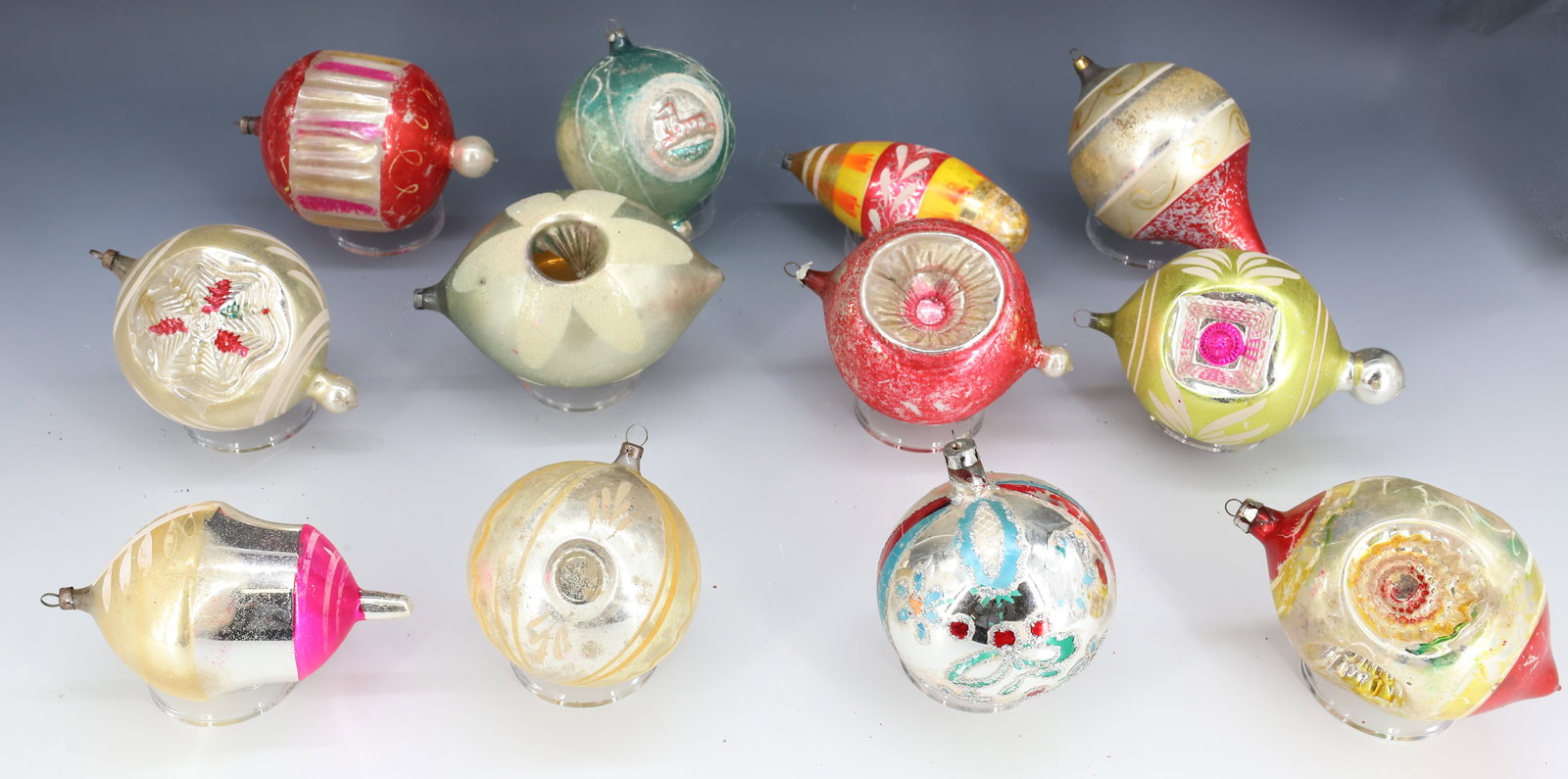 LOT OF (8) JUMBO SIZE GLASS CHRISTMAS ORNAMENTS: VARIOUS SHAPES AND COLORS. UNMARKED. LARGEST 6 1/4" L. PLEASE READ CAREFULLY - THIS IS AN ONLINE ONLY AUCTION -Terms for Purchasing and Shipping of Auction Items. Please read carefully before bidding.