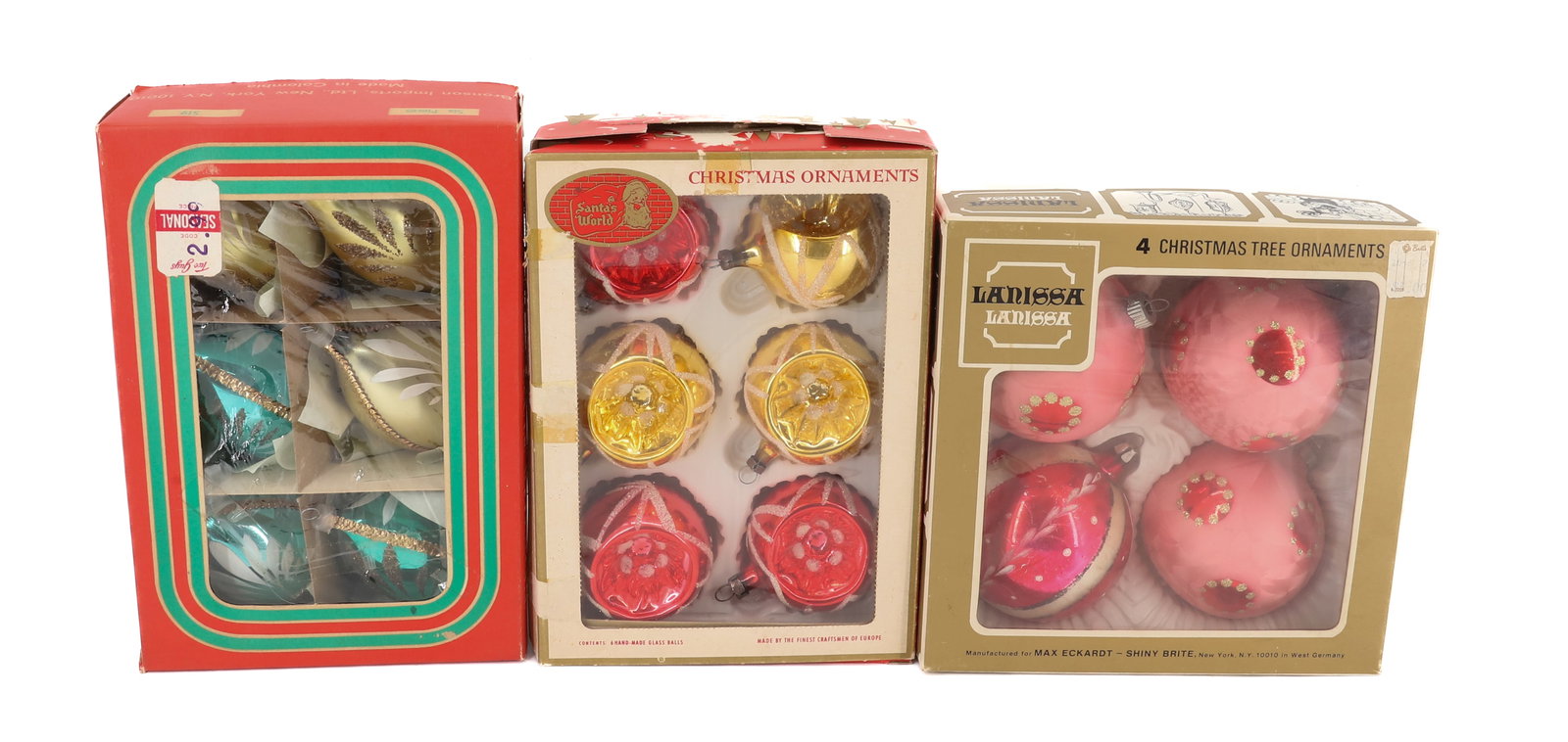 (3) BOXES OF VINTAGE GLASS CHRISTMAS ORNAMENTS: (16) ORNAMENTS IN ORIGINAL BOXES. ONE BOX MRKD. "MADE FOR MAX ECKHARDT-SHINY BRITE, WEST GERMANY". OTHERS MADE IN COLUMBIA AND CZECHOSLOVAKIA. PLEASE READ CAREFULLY - THIS IS AN ONLINE ONLY AUCTION -T