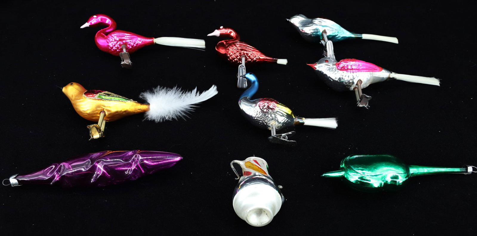 VARIETY OF GLASS CHRISTMAS ORNAMENTS: (9) INCLUDING: BIRDS, TEAPOT, CELLO AND MORE. LARGEST 6" L. PLEASE READ CAREFULLY - THIS IS AN ONLINE ONLY AUCTION -Terms for Purchasing and Shipping of Auction Items. Please read carefully before bid