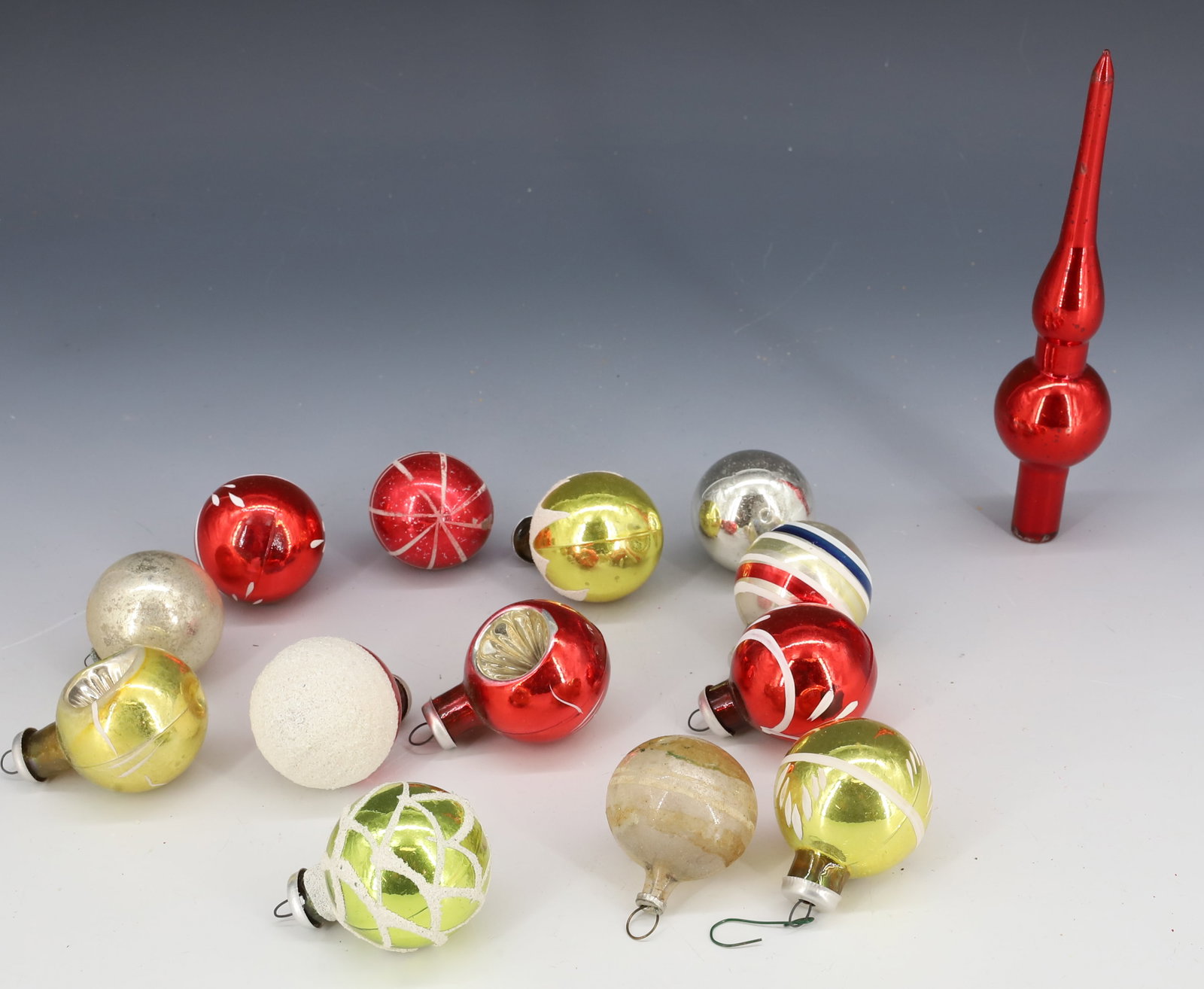 LOT OF VINTAGE GLASS CHRISTMAS ORNAMENTS: (13) SMALL SIZE ORNAMENTS (LARGEST 1 1/2") AND (1) TREE TOPPER 5 1/2" L. PLEASE READ CAREFULLY - THIS IS AN ONLINE ONLY AUCTION -Terms for Purchasing and Shipping of Auction Items. Please read careful