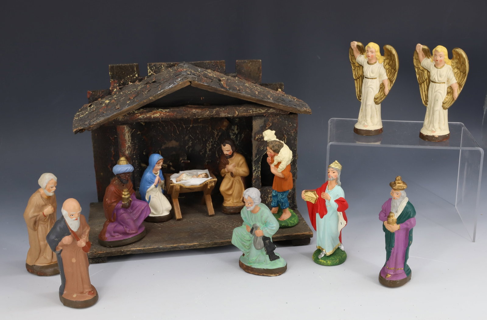 VINTAGE CHRISTMAS MANGER SCENE, CRECHE: GERMAN CHALKWARE FIGURES AND WOODEN MANGER 7" X 9". FIGURES STAMPED "GERMANY" ON BOTTOMS. PLEASE READ CAREFULLY - THIS IS AN ONLINE ONLY AUCTION -Terms for Purchasing and Shipping of Auction Items. Pl