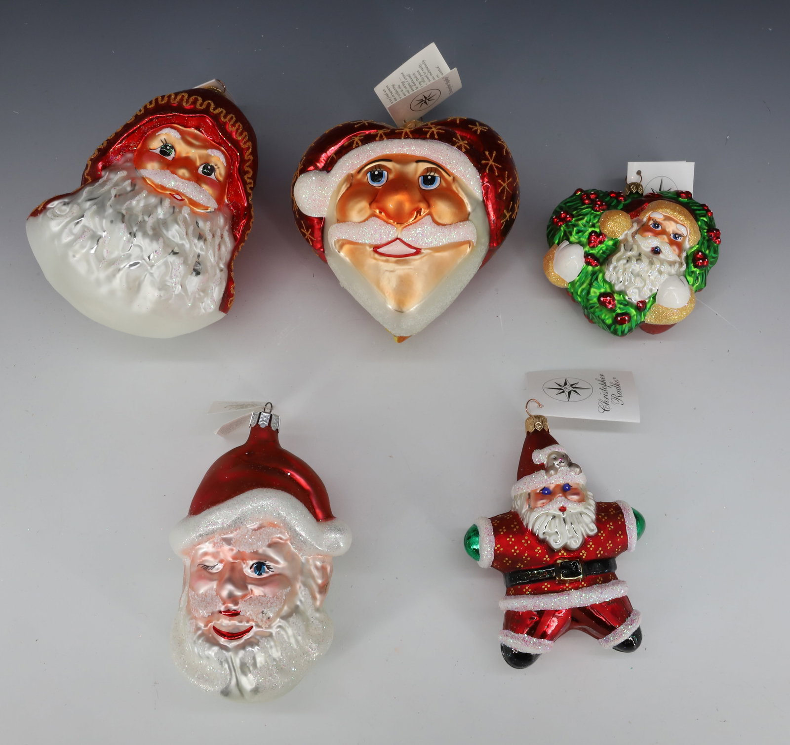 (5) VINTAGE CHRISTOPHER RADKO GLASS SANTA CLAUS ORNAMENTS: MADE IN POLAND. LARGEST 5 1/2" H. PLEASE READ CAREFULLY - THIS IS AN ONLINE ONLY AUCTION -Terms for Purchasing and Shipping of Auction Items. Please read carefully before bidding. Hartzell?s Auction G