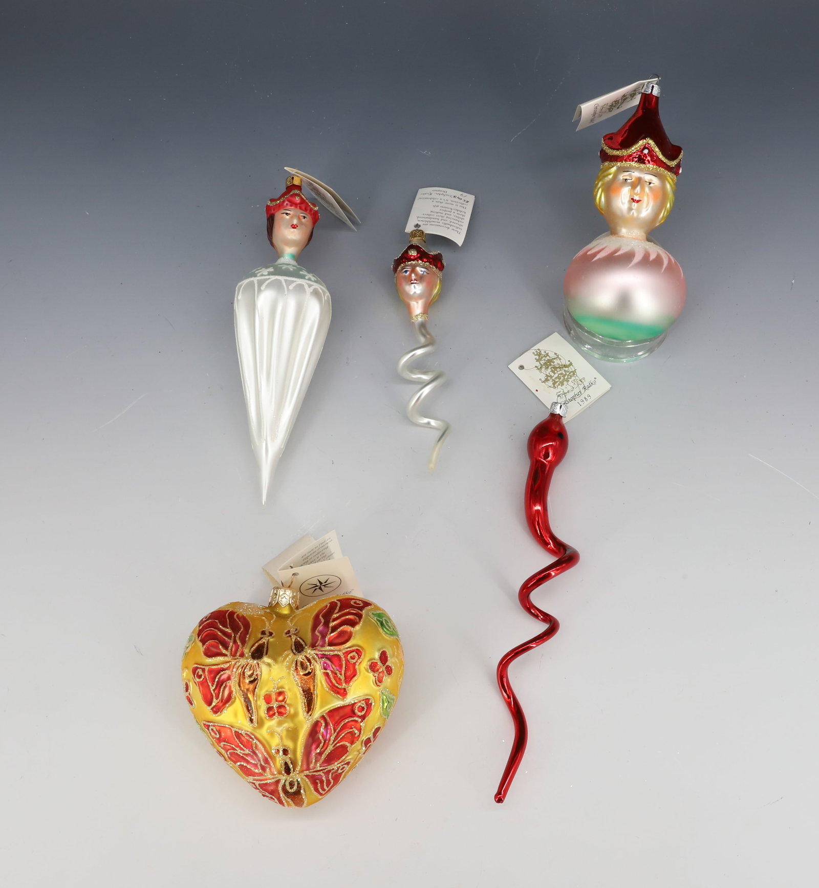 (5) VINTAGE CHRISTOPHER RADKO GLASS ORNAMENTS: HEART, UMBRELLA, SNAKE AND MORE. LARGEST 7 1/4" L. ORIGINAL TAGS. PLEASE READ CAREFULLY - THIS IS AN ONLINE ONLY AUCTION -Terms for Purchasing and Shipping of Auction Items. Please read carefully befo