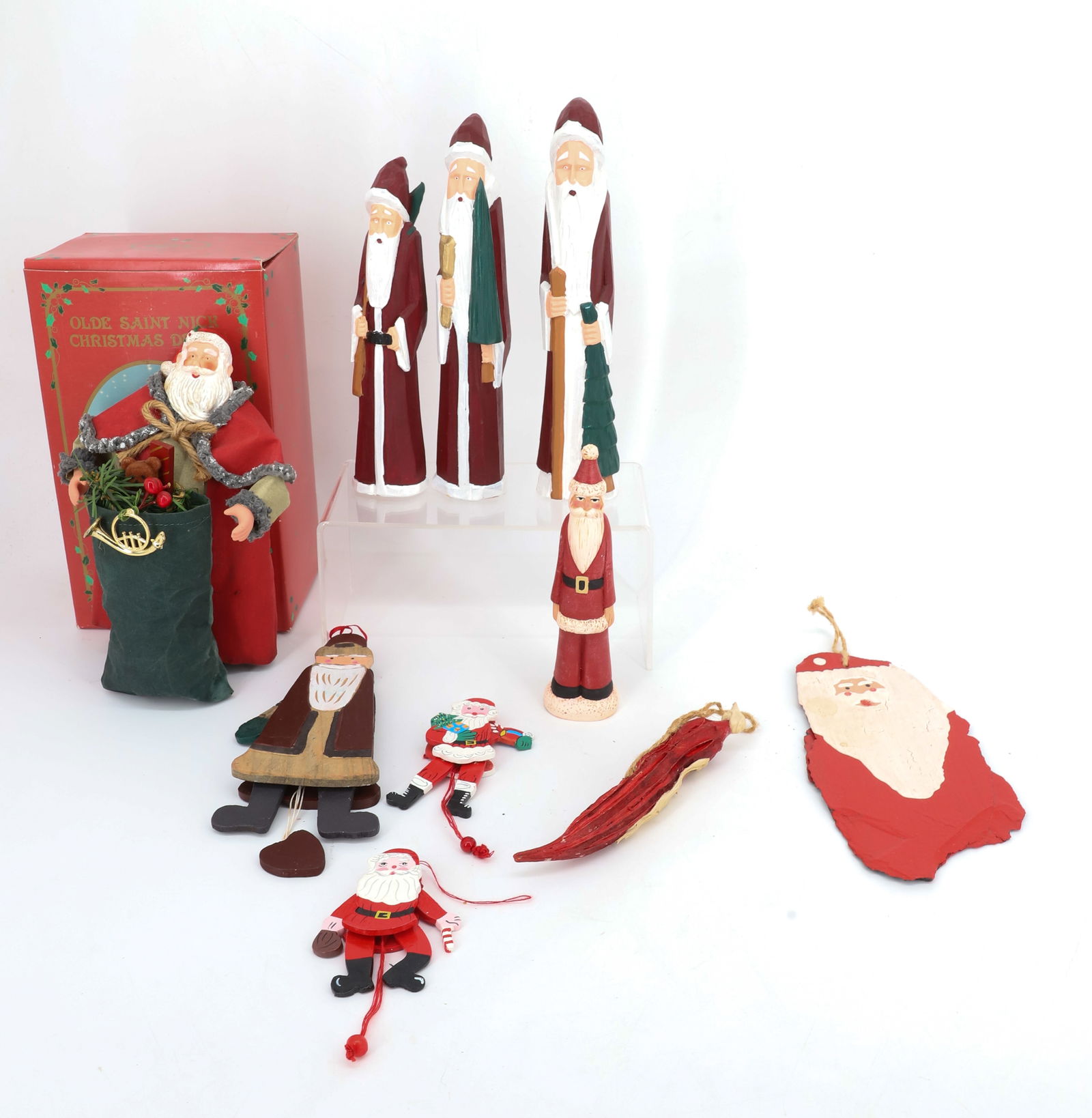 LOT OF CONTEMPORARY CHRISTMAS DECORATIONS: CARVED AND PAINTED WOODEN SANTA CLAUS'S AND MORE. LARGEST WOODEN 9" H. PLEASE READ CAREFULLY - THIS IS AN ONLINE ONLY AUCTION -Terms for Purchasing and Shipping of Auction Items. Please read carefully