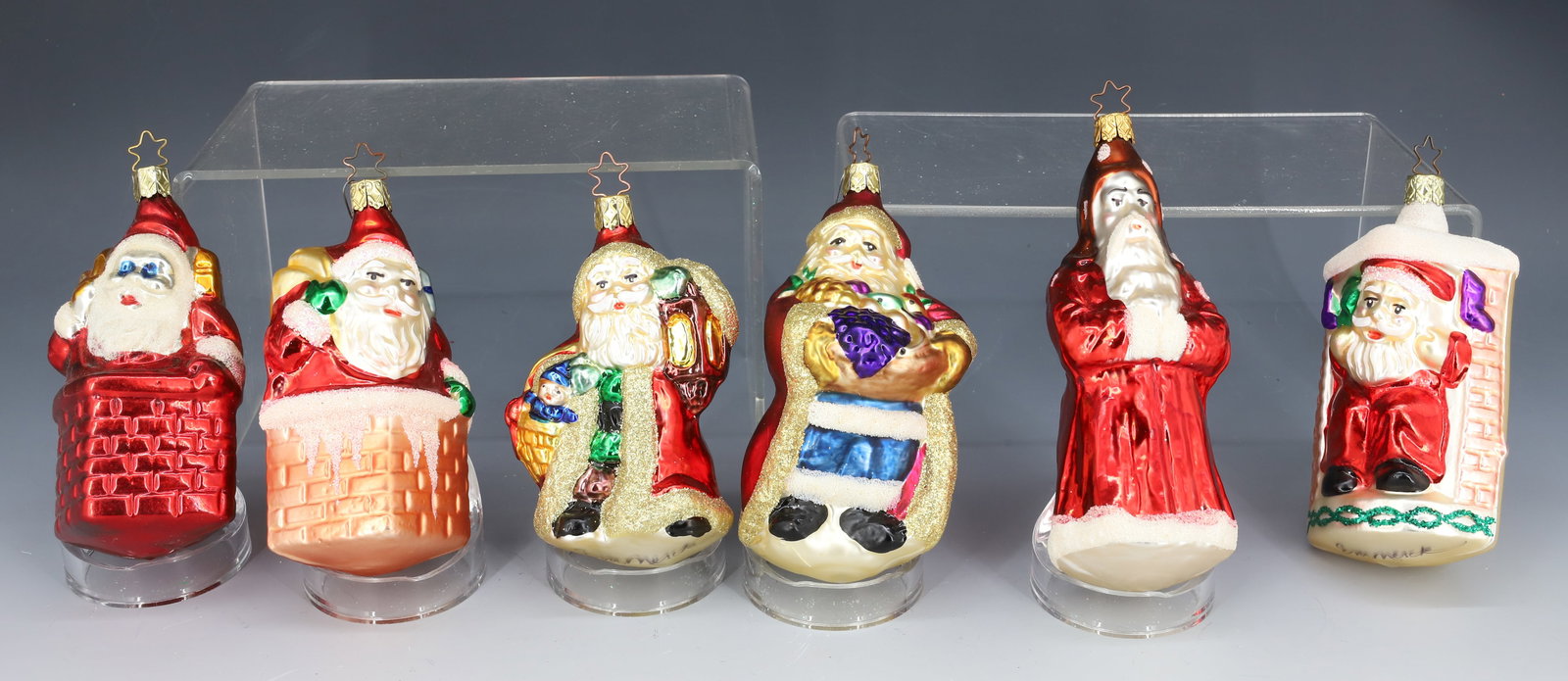 LOT OF GLASS SANTA CLAUS ORNAMENTS: VARIETY OF DIFFERENT SANTAS. LARGEST 5 1/2" H. PLEASE READ CAREFULLY - THIS IS AN ONLINE ONLY AUCTION -Terms for Purchasing and Shipping of Auction Items. Please read carefully before bidding. Hartzel