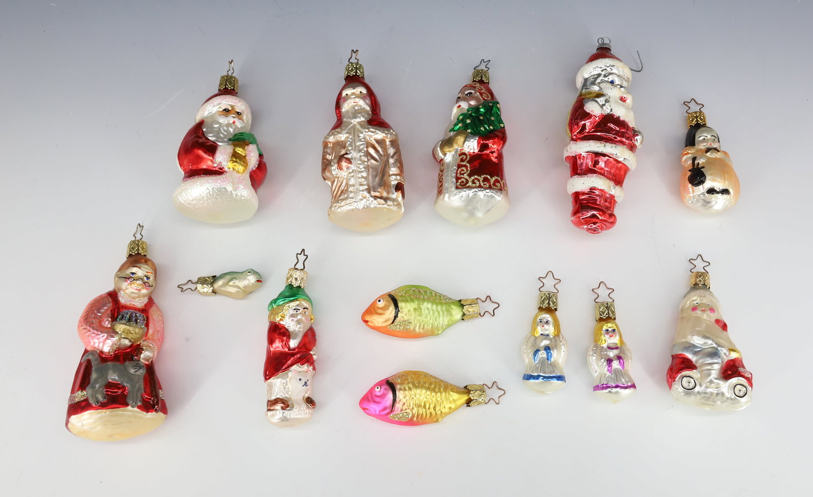 LOT OF GLASS FIGURAL CHRISTMAS ORNAMENTS: VARIETY OF SANTAS, FISH, ANGELS AND MORE. LARGEST 4" H. PLEASE READ CAREFULLY - THIS IS AN ONLINE ONLY AUCTION -Terms for Purchasing and Shipping of Auction Items. Please read carefully before bidding