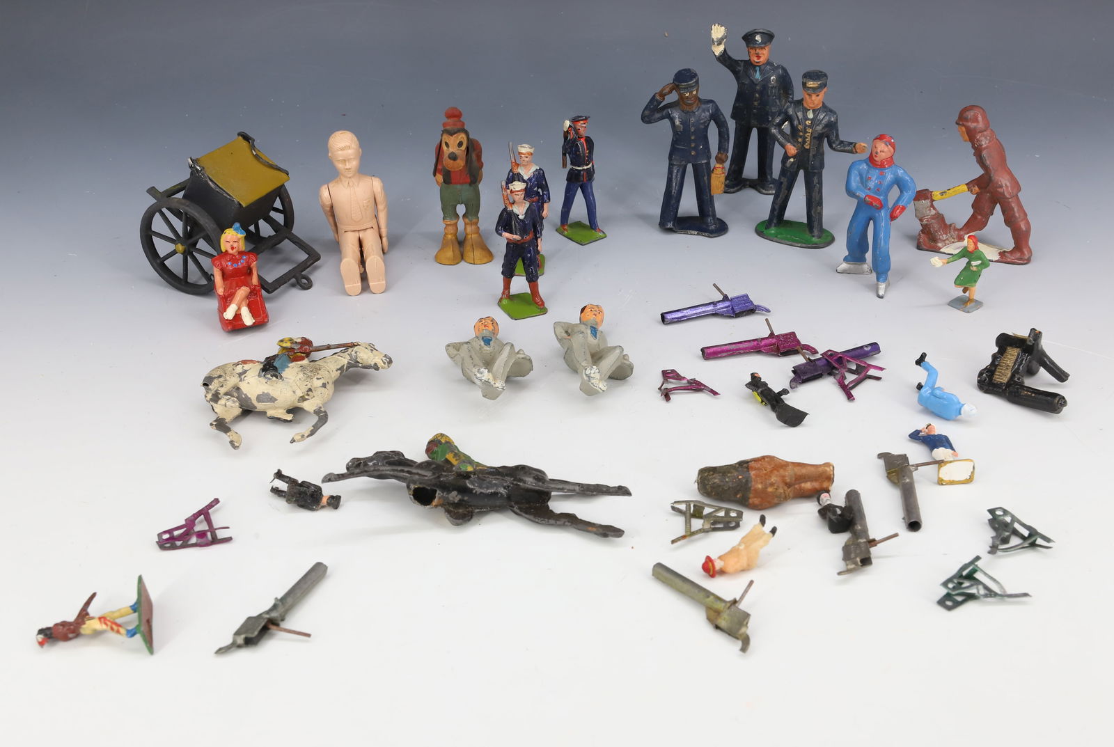 VARIETY OF PAINTED METAL TOY FIGURES (1 of 4)