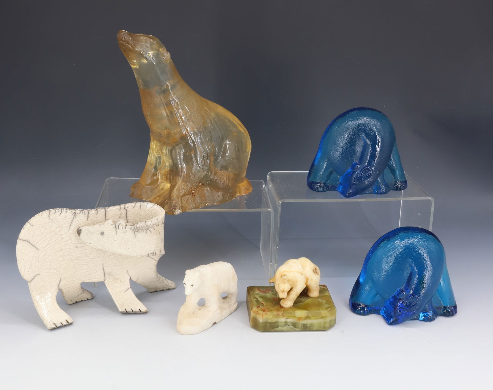 LOT OF VINTAGE POLAR BEARS: VARIOUS SIZES, STYLES AND MATERIALS. INCLUDING: GLASS, RESIN, POTTERY AND MORE. LARGEST 7 3/4" H. PLEASE READ CAREFULLY - THIS IS AN ONLINE ONLY AUCTION -Terms for Purchasing and Shipping of Auction I