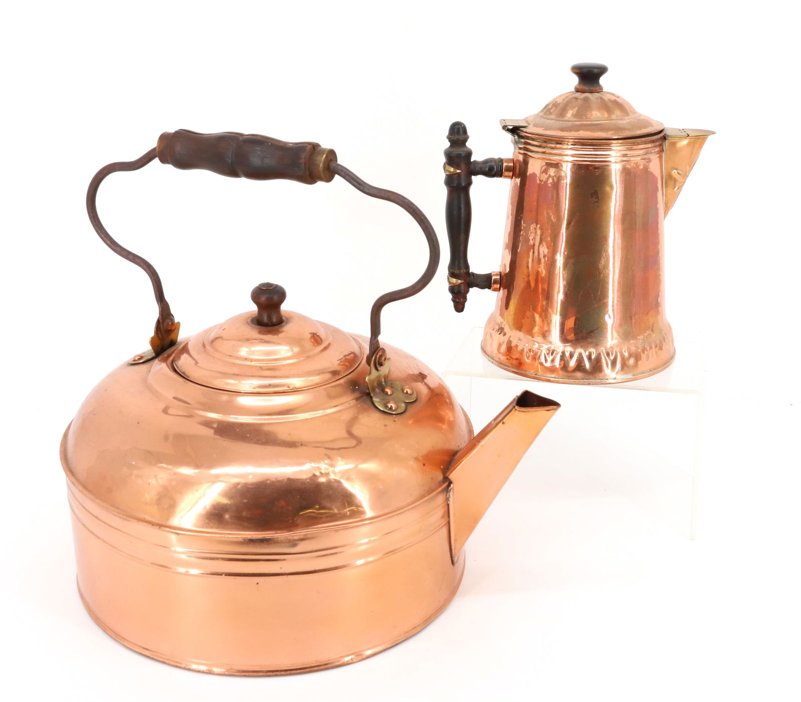 COPPER COFFEE AND TEAPOT: COPPER POT MRKD. "REED" 8 1/2" H. AND SWING HANDLE TEAPOT. 13" D. PLEASE READ CAREFULLY - Terms for Purchasing and Shipping of Auction Items. Please read carefully before bidding. Hartzell?s Auction G