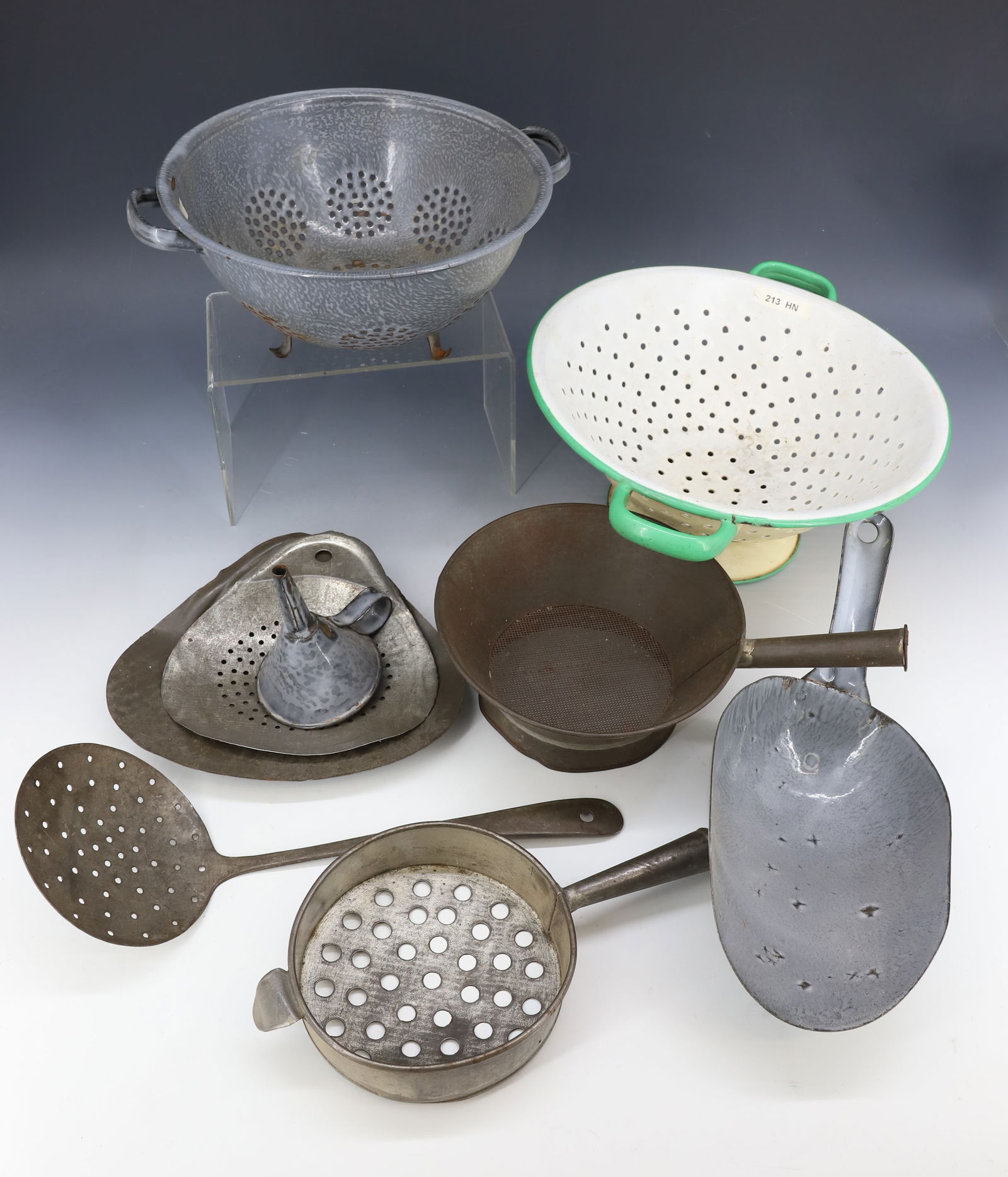 LOT OF AGATE AND TINWARE: INCLUDING: COLANDERS, FUNNEL, SCOOP. TIN MILK SKIMMERS AND MORE. GREEN/WHITE COLANDER 13" D. PLEASE READ CAREFULLY - Terms for Purchasing and Shipping of Auction Items. Please read carefully before bi