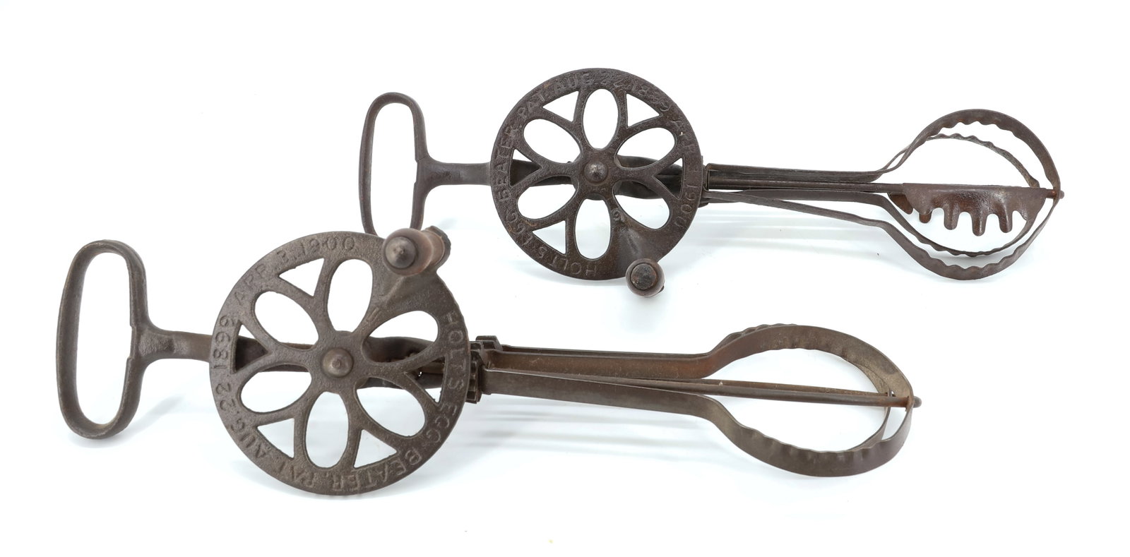 (2) ANTIQUE HOLT'S EGG BEATERS: CAST IRON AND METAL. PATENT 1900. 12 1/4" L. SLIGHTLY DIFFERENT "BEATERS". PLEASE READ CAREFULLY - Terms for Purchasing and Shipping of Auction Items. Please read carefully before bidding. Hartzell?s 