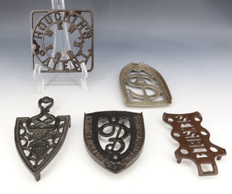 LOT OF CAST IRON TRIVETS