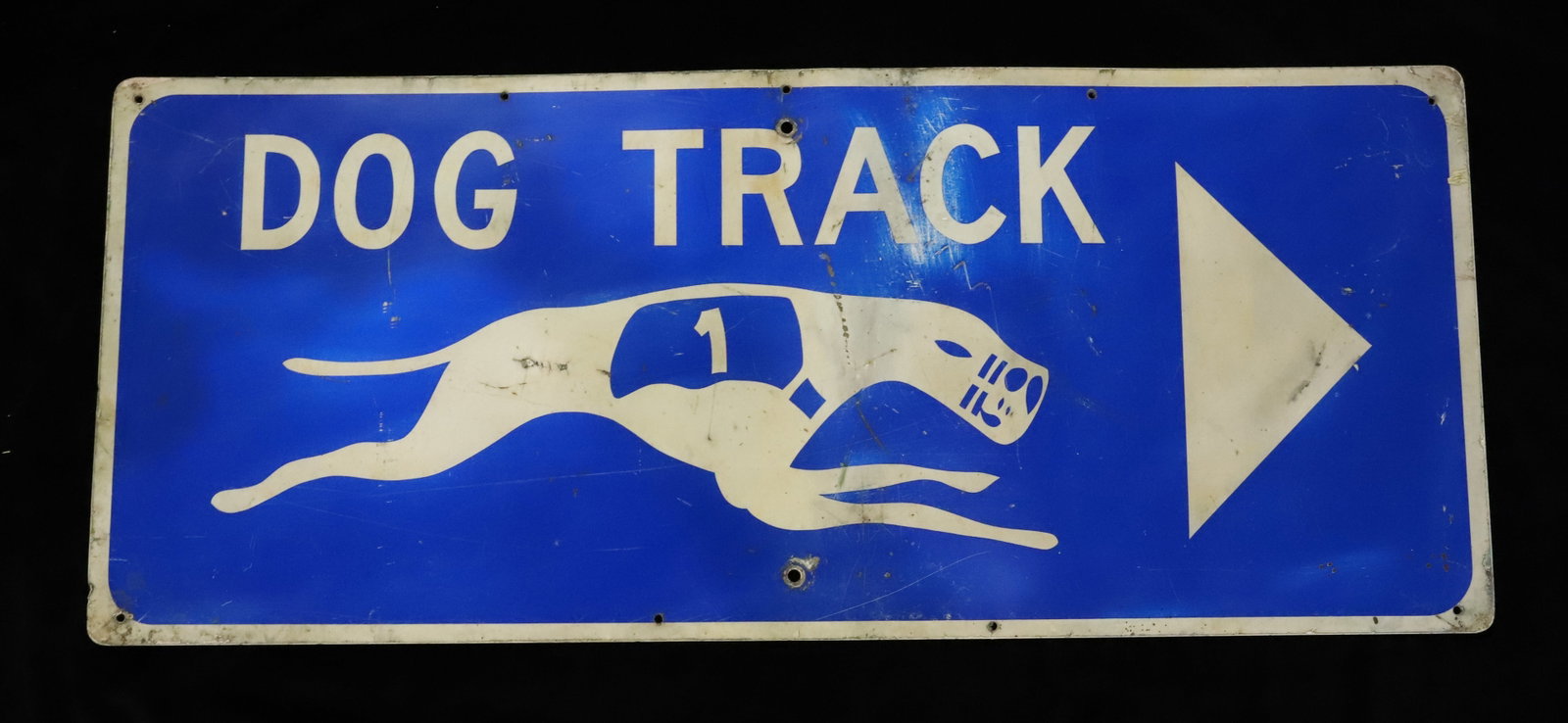 "DOG TRACK" METAL SIGN: PAINTED METAL. 15" X 36". PLEASE READ CAREFULLY - Terms for Purchasing and Shipping of Auction Items. Please read carefully before bidding. Hartzell?s Auction Gallery. Hartzell's Auction Gallery will 
