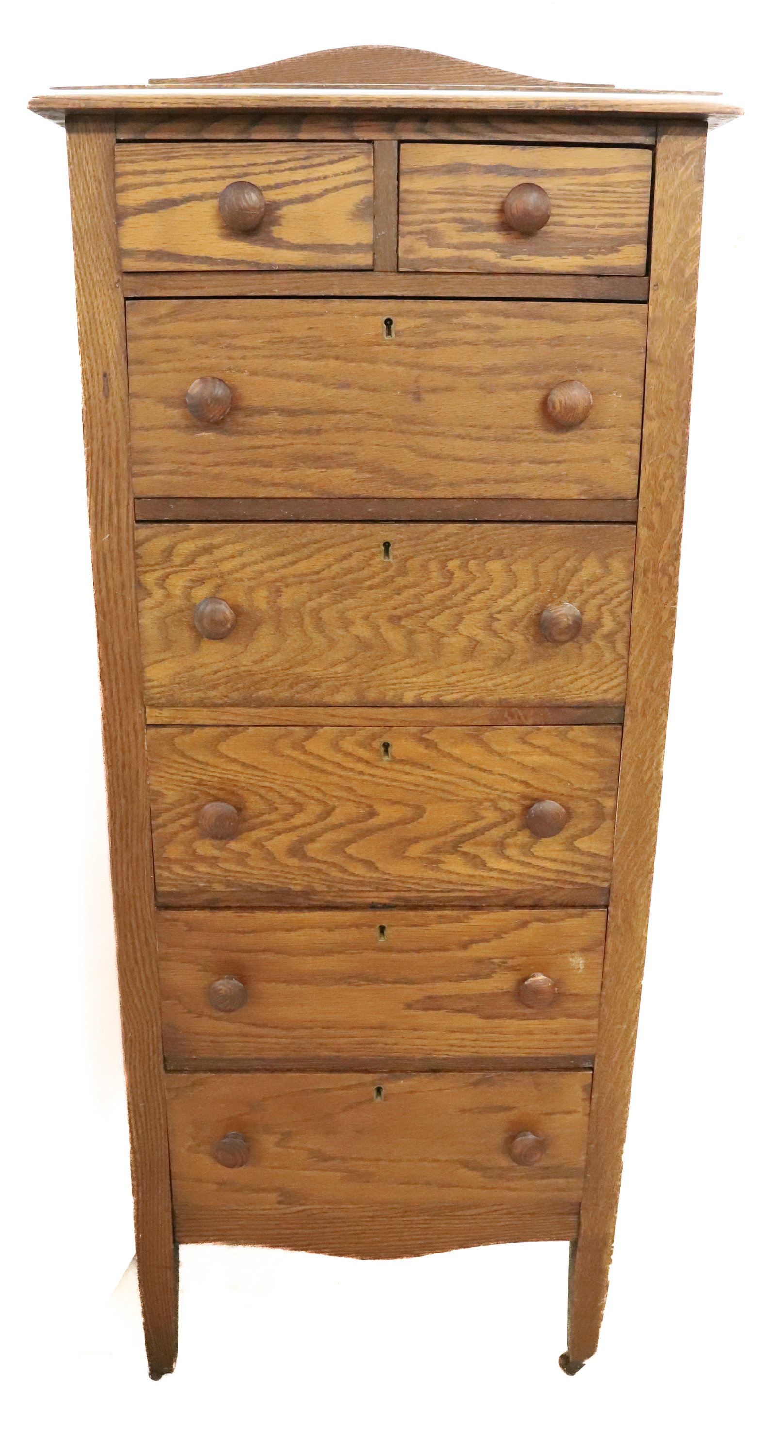 PETITE OAK CHEST OF DRAWERS: TWO SMALL DRAWERS OVER FIVE DRAWERS. PANELED SIDES. 58" X 22" X 18". PLEASE READ CAREFULLY - Terms for Purchasing and Shipping of Auction Items. Please read carefully before bidding. Hartzell?s Auctio