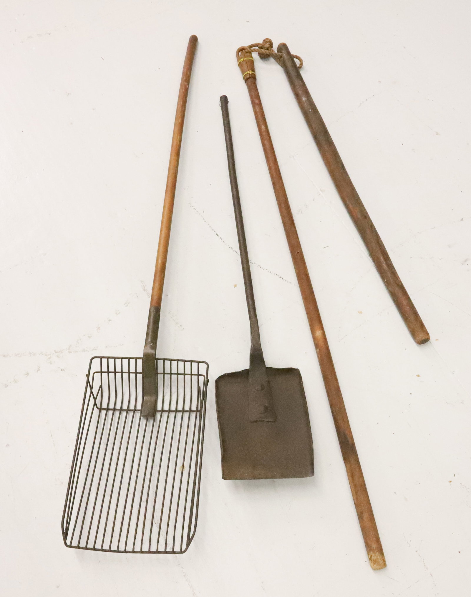 ANTIQUE SHOVEL, FLAIL AND POULTRY SIFTER: WROUGHT IRON ASH SHOVEL 36 1/2" L., WOODEN FLAIL AND POULTRY SIFTER. PLEASE READ CAREFULLY - Terms for Purchasing and Shipping of Auction Items. Please read carefully before bidding. Hartzell?s Auctio