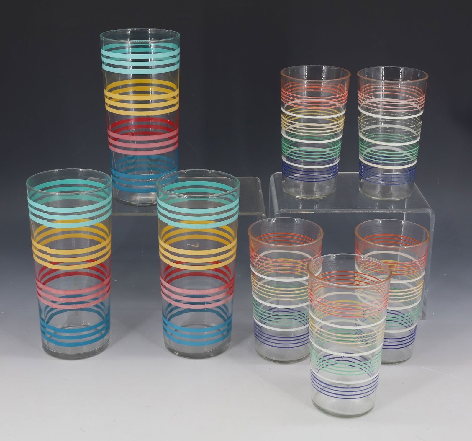 LOT OF VINTAGE STRIPED GLASSES: (3) 6 3/8" H. AND (5) 4 3/4" H. PLEASE READ CAREFULLY - Terms for Purchasing and Shipping of Auction Items. Please read carefully before bidding. Hartzell?s Auction Gallery. Hartzell's Auction Gallery