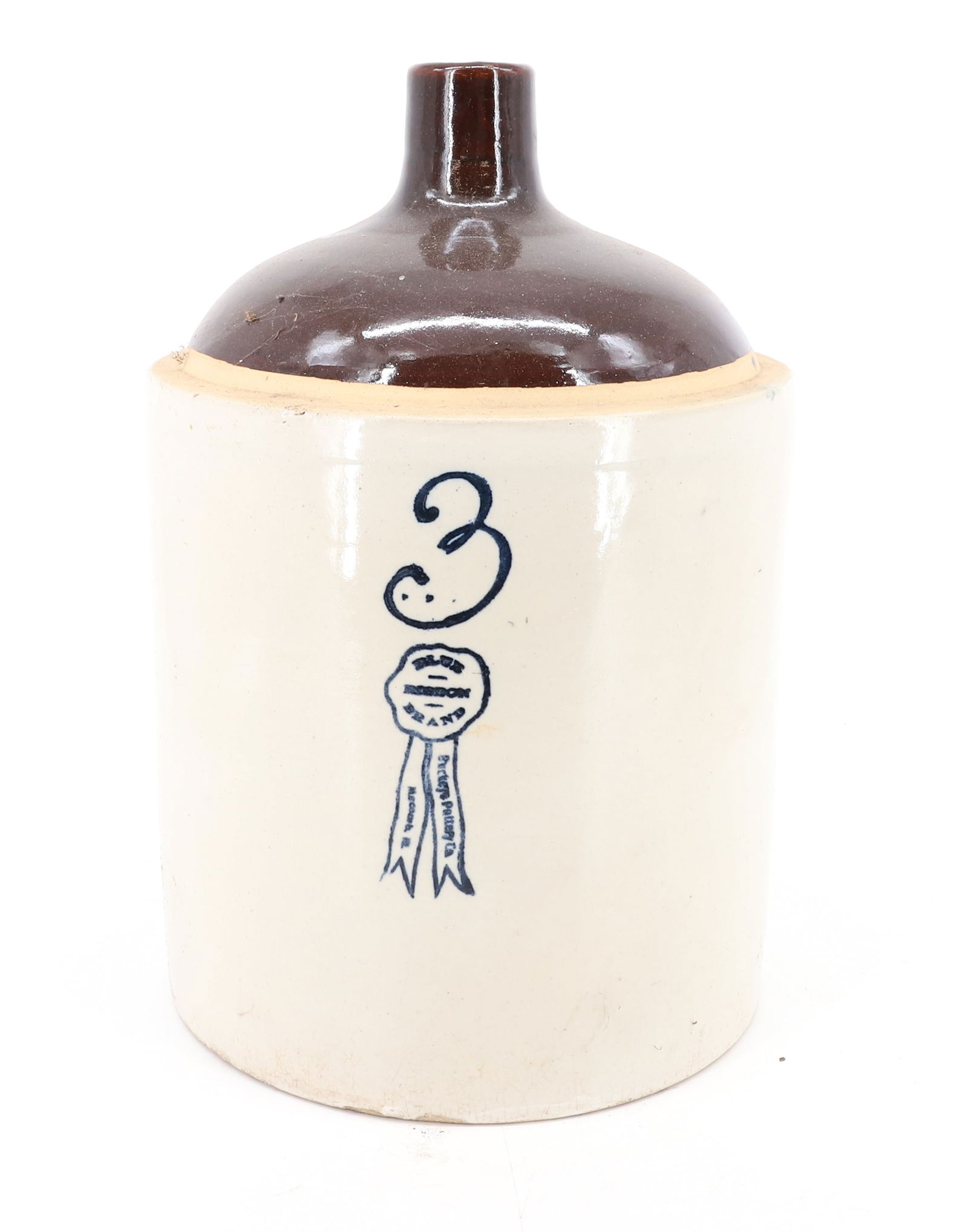 THREE-GALLON BUCKEYE POTTERY JUG: BLUE "3" AND RIBBON ON FRONT. READS "BLUE RIBBON BRAND, BUCKEYE POTTERY CO., MACOMB, ILL" 15" H. PLEASE READ CAREFULLY - Terms for Purchasing and Shipping of Auction Items. Please read carefully befor
