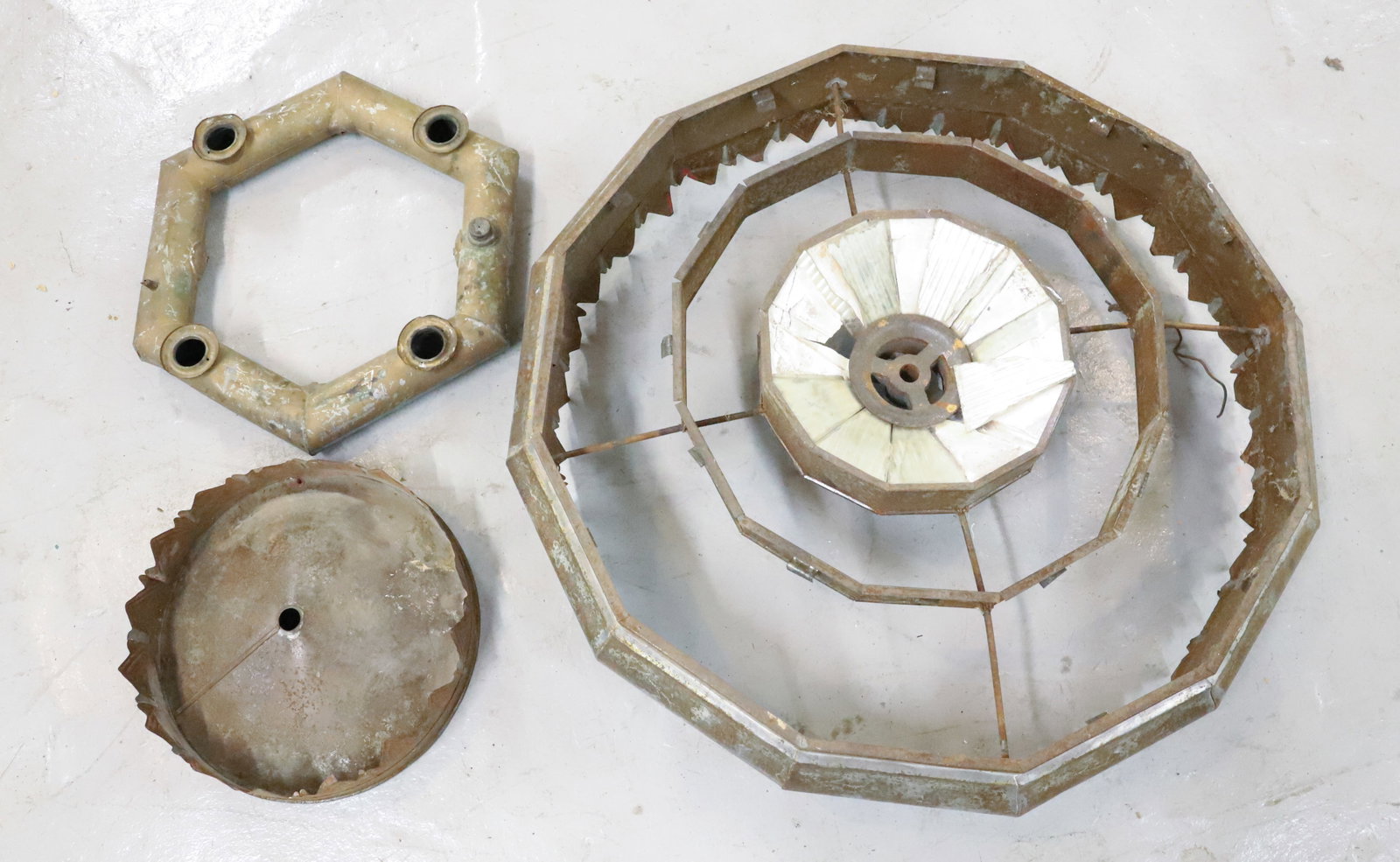 PRESSED METAL HANGING LIGHT: AS-FOUND. THREE PIECES OF PRESSED METAL. FEW PIECES OF ORIGINAL REFLECTIVE GLASS. LARGEST PIECE 26" D. PLEASE READ CAREFULLY - Terms for Purchasing and Shipping of Auction Items. Please read carefully
