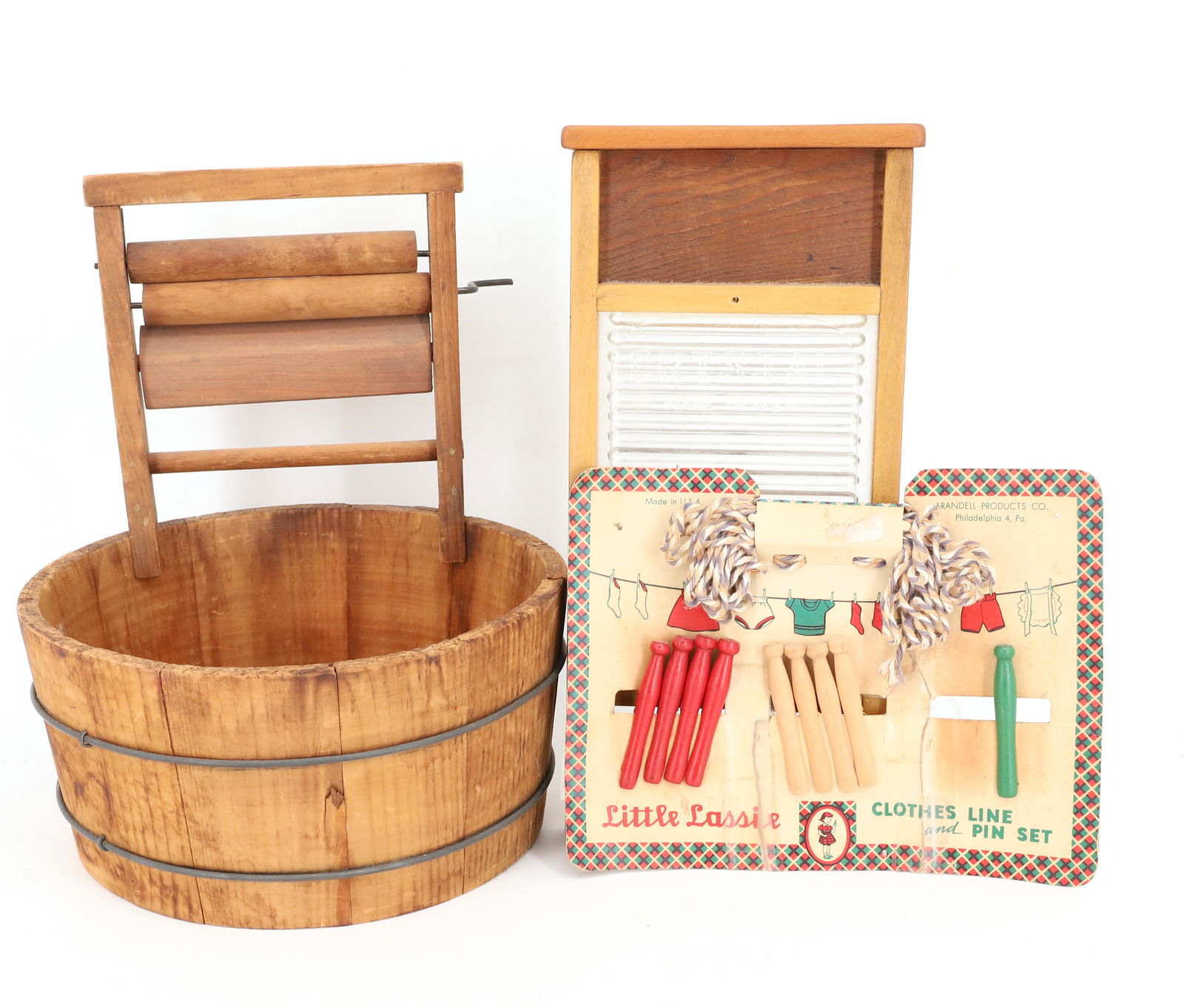 LOT OF CHILDREN'S LAUNDRY TOYS: INCLUDING: WOODEN WASH TUB WITH WRINGER 8 3/4" D., CRYSTAL WASHBOARD AND "LITTLE LASSIE, CLOTHES LINE AND PIN SET" PLEASE READ CAREFULLY - Terms for Purchasing and Shipping of Auction Items. Please re
