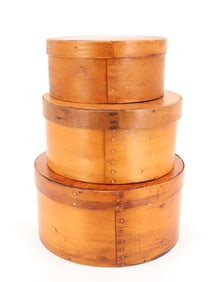 STACK OF WOODEN PANTRY BOXES