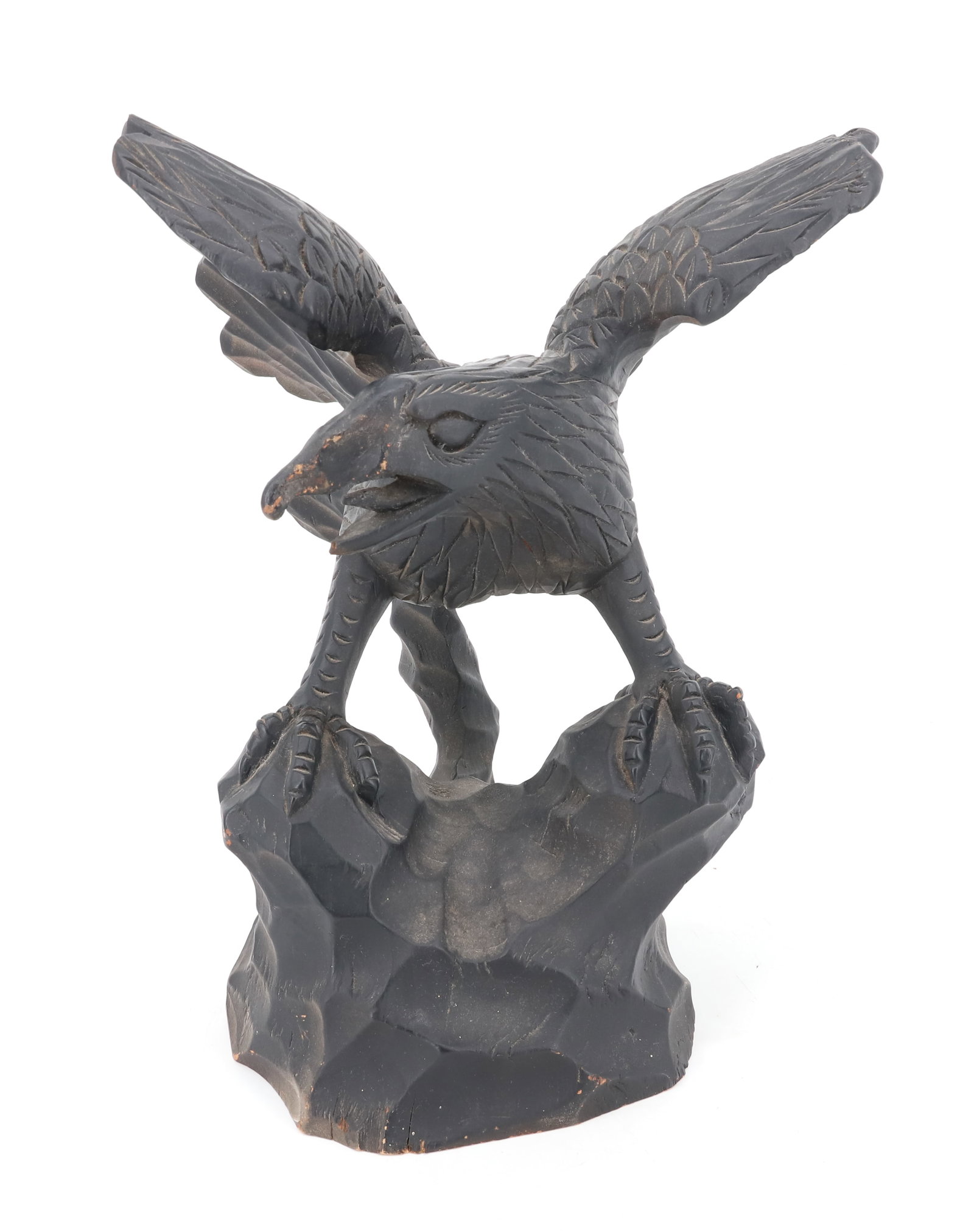 CARVED WOODEN BIRD: BLACK PAINTED BIRD (EAGLE) ON ROCKS. 14" X 12" X 9". PLEASE READ CAREFULLY - Terms for Purchasing and Shipping of Auction Items. Please read carefully before bidding. Hartzell’s Auction Gallery.
