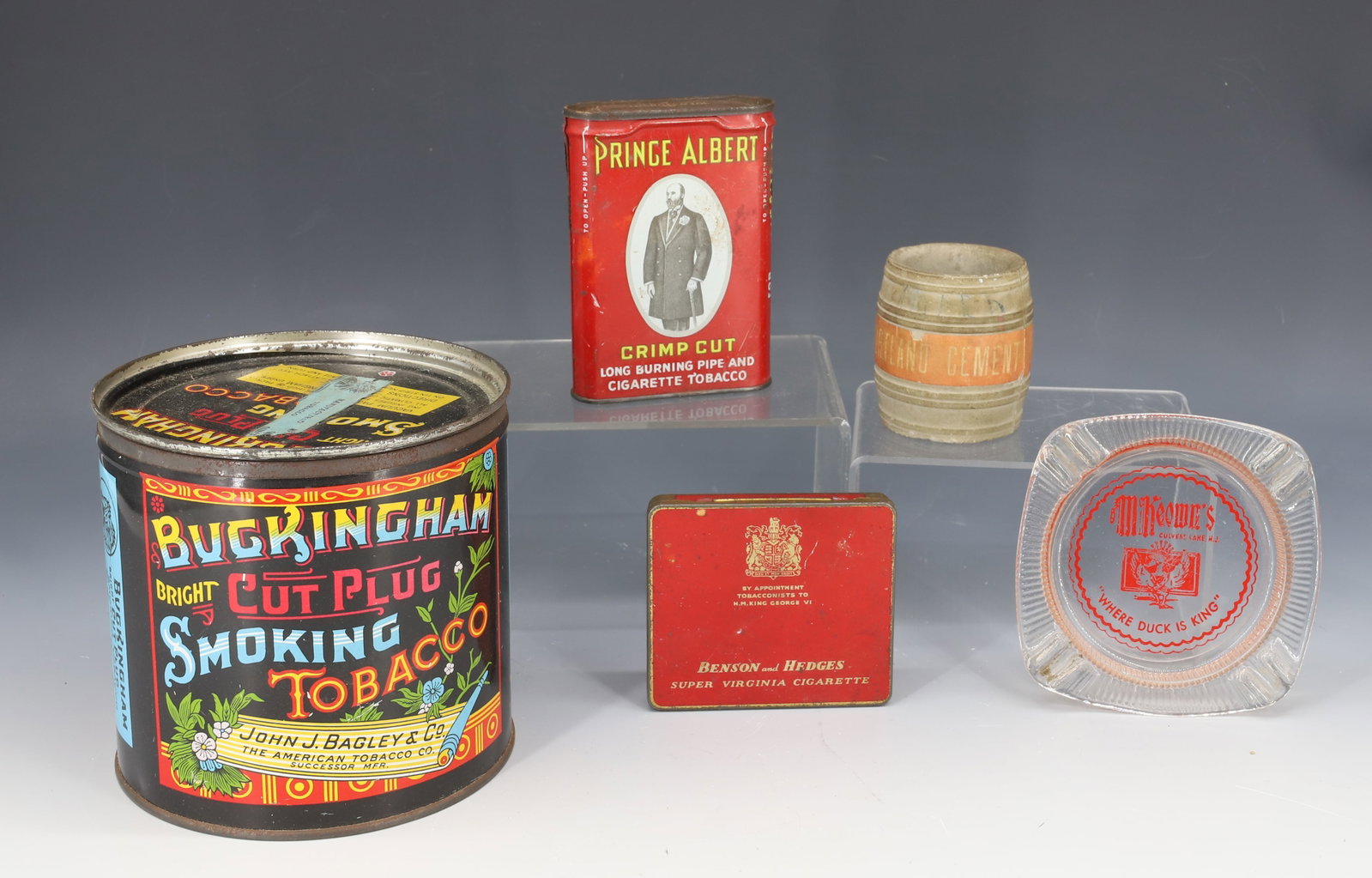 LOT OF ADVERTISING TINS AND MORE: INCLUDING: BUCKINGHAM BRIGHT CUT PLUG SMOKING TOBACCO 5" X 5", PRINCE ALBERT, BENSON&HEDGES. PORTLAND CEMENT MATCH HOLDER AND "MCKEOWN'S CULVERS LAKE, NJ" ASHTRAY. PLEASE READ CAREFULLY - Terms for Pu