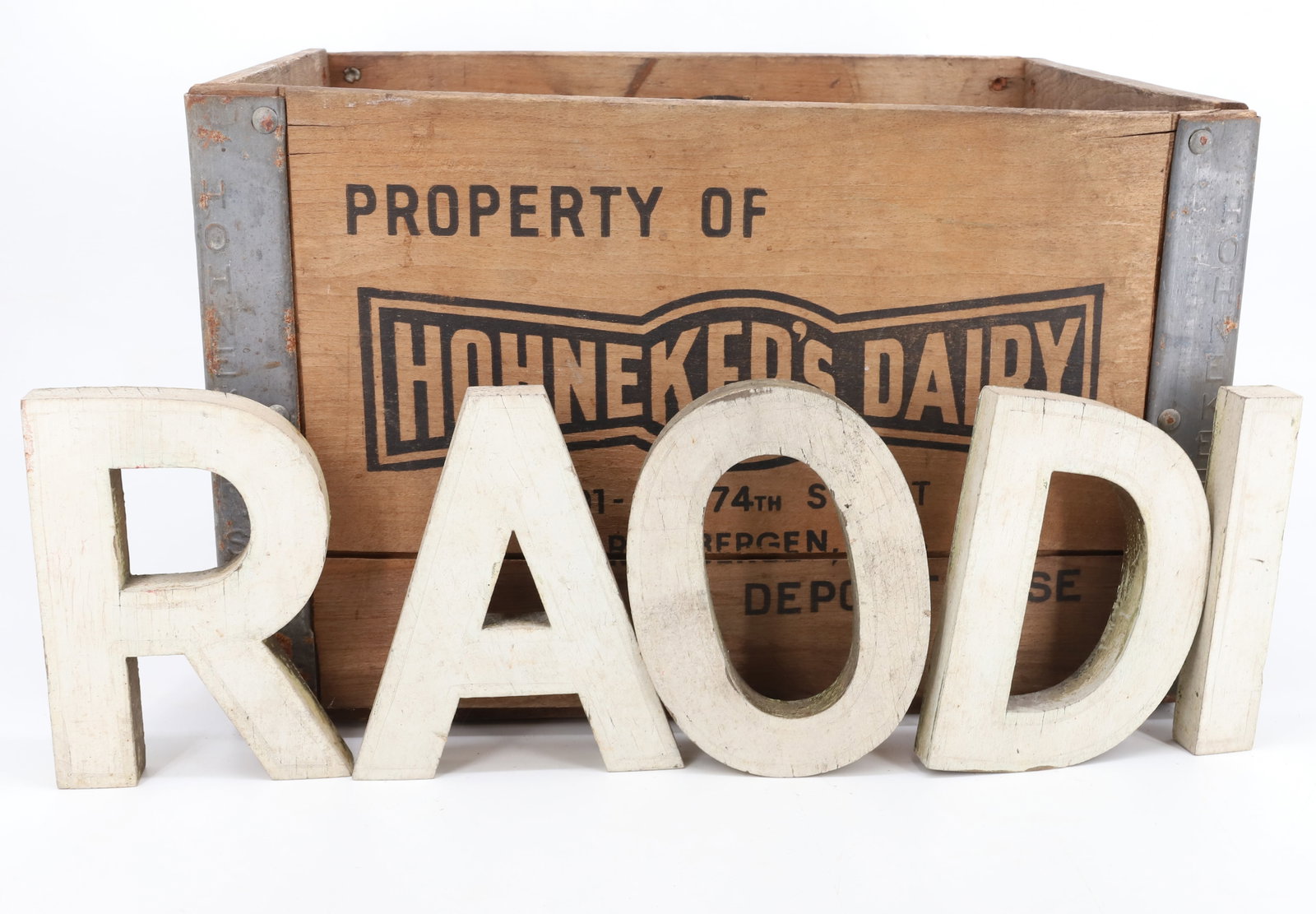 WOODEN MILK CRATE AND LETTERS: HOHNEKER DAIRY, NORTH BERGEN MILK CRATE 16" L. WITH, WHITE PAINTED LETTERS "RADIO" 6" H. PLEASE READ CAREFULLY - Terms for Purchasing and Shipping of Auction Items. Please read carefully before biddin