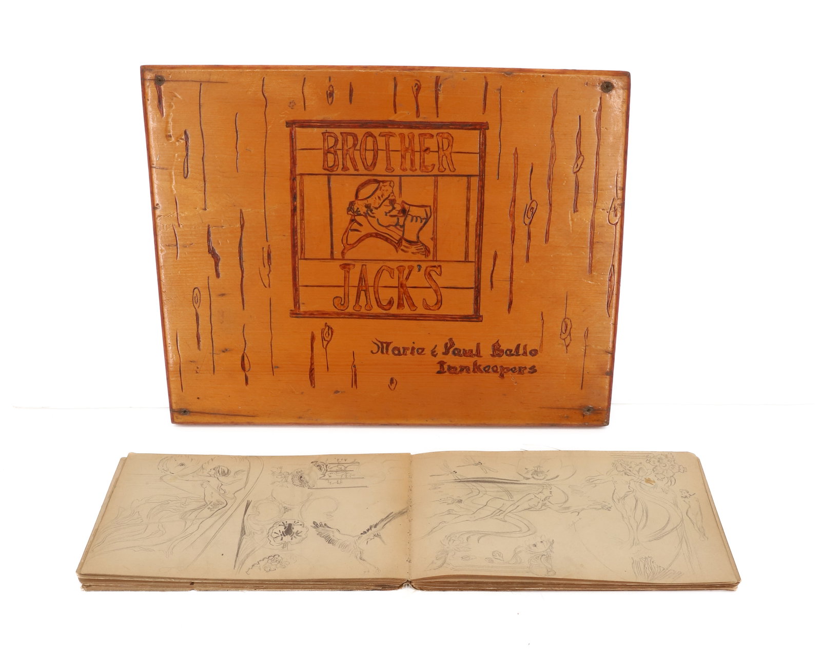 VINTAGE ARTIST'S SKETCHBOOK AND INN PLAQUE: SKETCHBOOK MRKD. "W.G. READ, 234 ADAM ST. BROOKLYN". PENCIL ON PAPER (ONE PAGE OF WATERCOLOR). VARIOUS SKETCHES OF STATUES, ARCHITECTURE, FIGURES, FLORAL AND MORE. 5 1/4" X 9 1/4". WITH, "BROTHER JACK