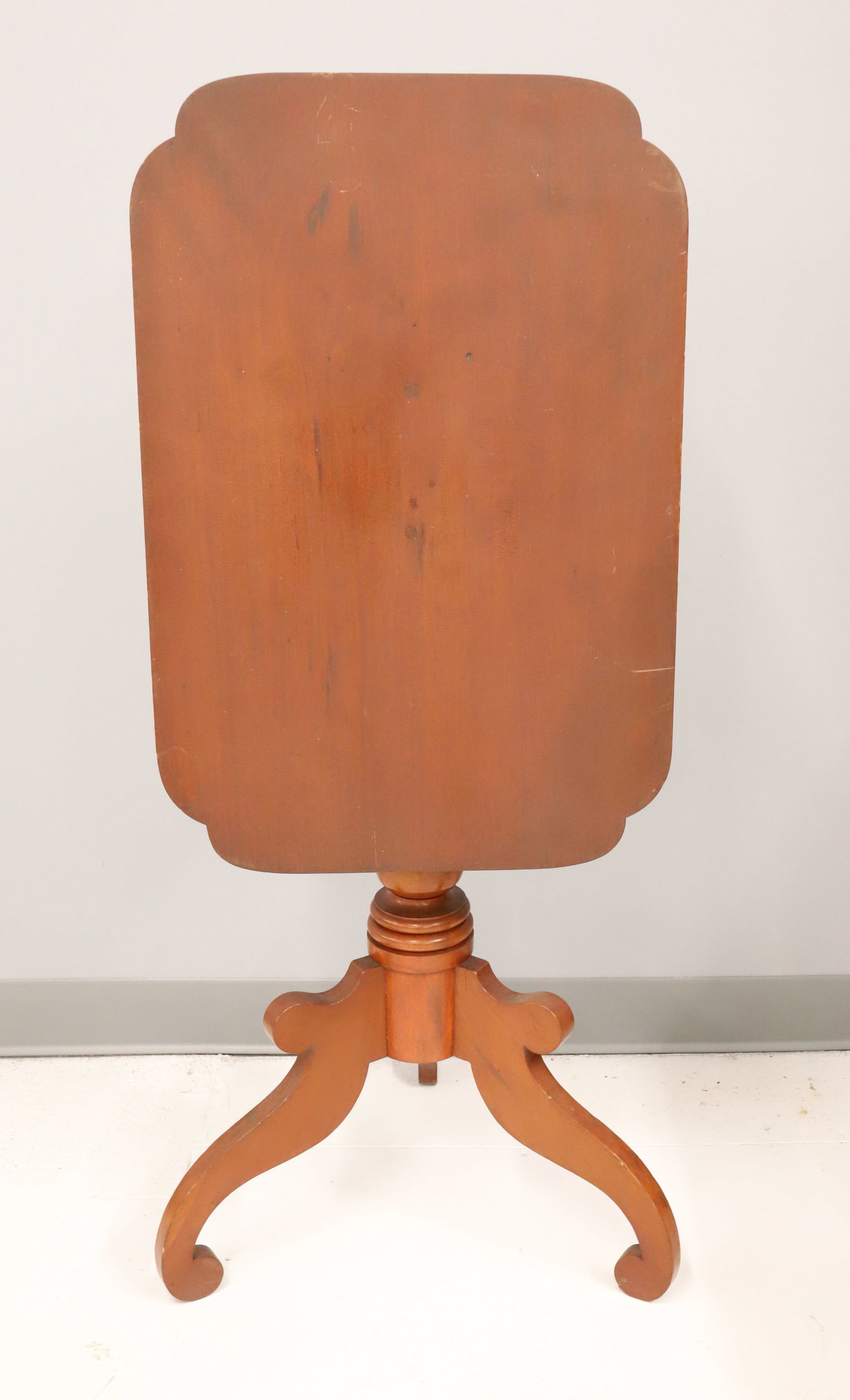 19TH C. TILT-TOP TABLE: RECTANGULAR TOP ON HEAVY TURNED BASE WITH THREE LEGS. 29 1/2" X 26 1/4" X 17 1/2". PLEASE READ CAREFULLY - Terms for Purchasing and Shipping of Auction Items. Please read carefully before bidding. Har