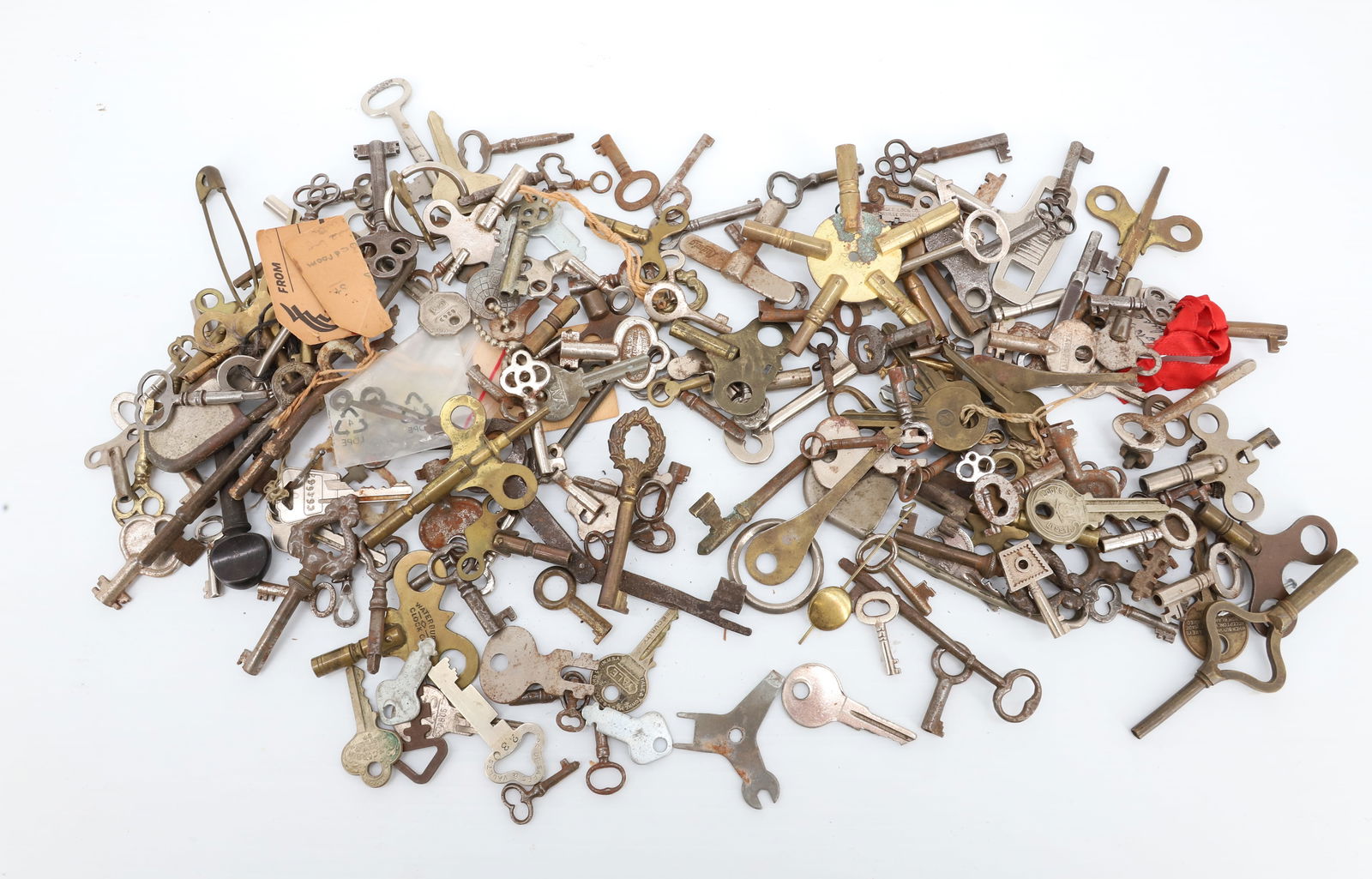 LARGE LOT OF ANTIQUE KEYS: STEEL AND BRASS DOOR AND CLOCK KEYS. MORE. PLEASE READ CAREFULLY - Terms for Purchasing and Shipping of Auction Items. Please read carefully before bidding. Hartzell’s Auction Gallery. Hartzell'