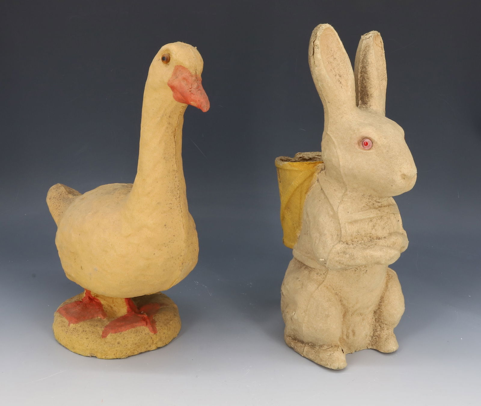 VINTAGE PULP EASTER RABBIT AND GOOSE, PAPIER MACHE: RABBIT WITH BASKET AND GLASS EYES 10 1/2" H. GOOSE HAS OPENING IN BOTTOM 10" H. PLEASE READ CAREFULLY - Terms for Purchasing and Shipping of Auction Items. Please read carefully before bidding. Hartze