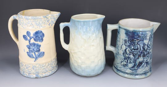 (3) BLUE / WHITE STONEWARE PITCHERS