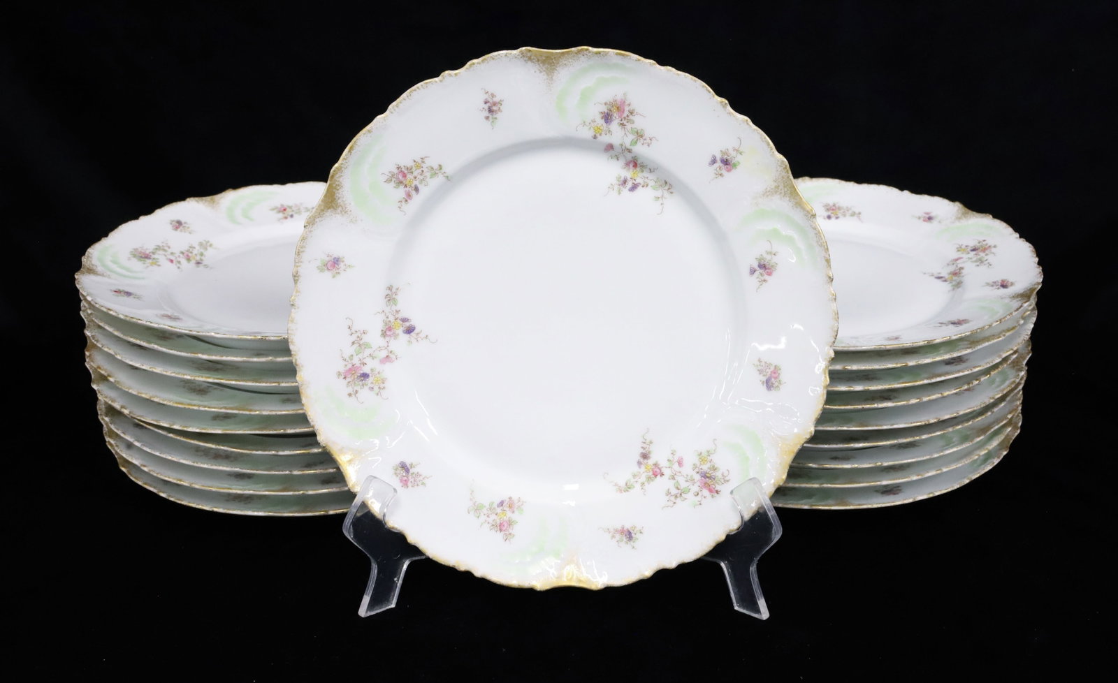 LOT OF MATCHING DINNER PLATES: (19) UNMARKED PORCELAIN PLATES WITH FLORAL MOTIF. 10" D. PLEASE READ CAREFULLY - Terms for Purchasing and Shipping of Auction Items. Please read carefully before bidding. Hartzell’s Auction Gall