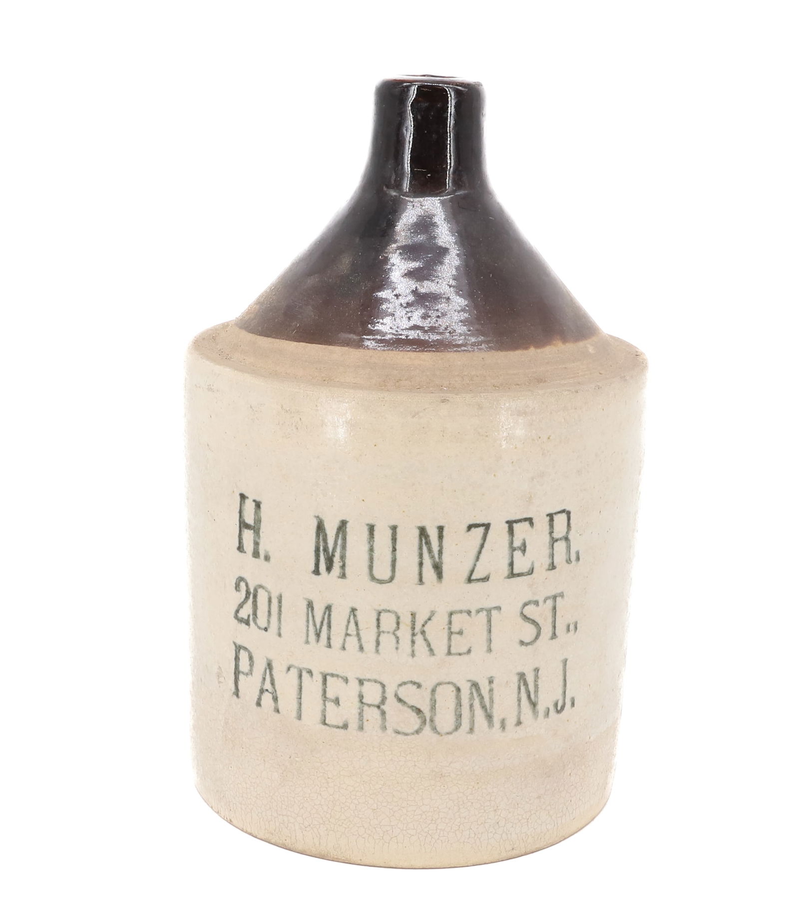 H. MUNZER STONEWARE ADVERTISING JUG: PATERSON, NJ. 11 1/2" H. PLEASE READ CAREFULLY - Terms for Purchasing and Shipping of Auction Items. Please read carefully before bidding. Hartzell’s Auction Gallery. Hartzell's Auction Gallery