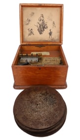 ANTIQUE REGINA DISC PLAYER W/ DISCS