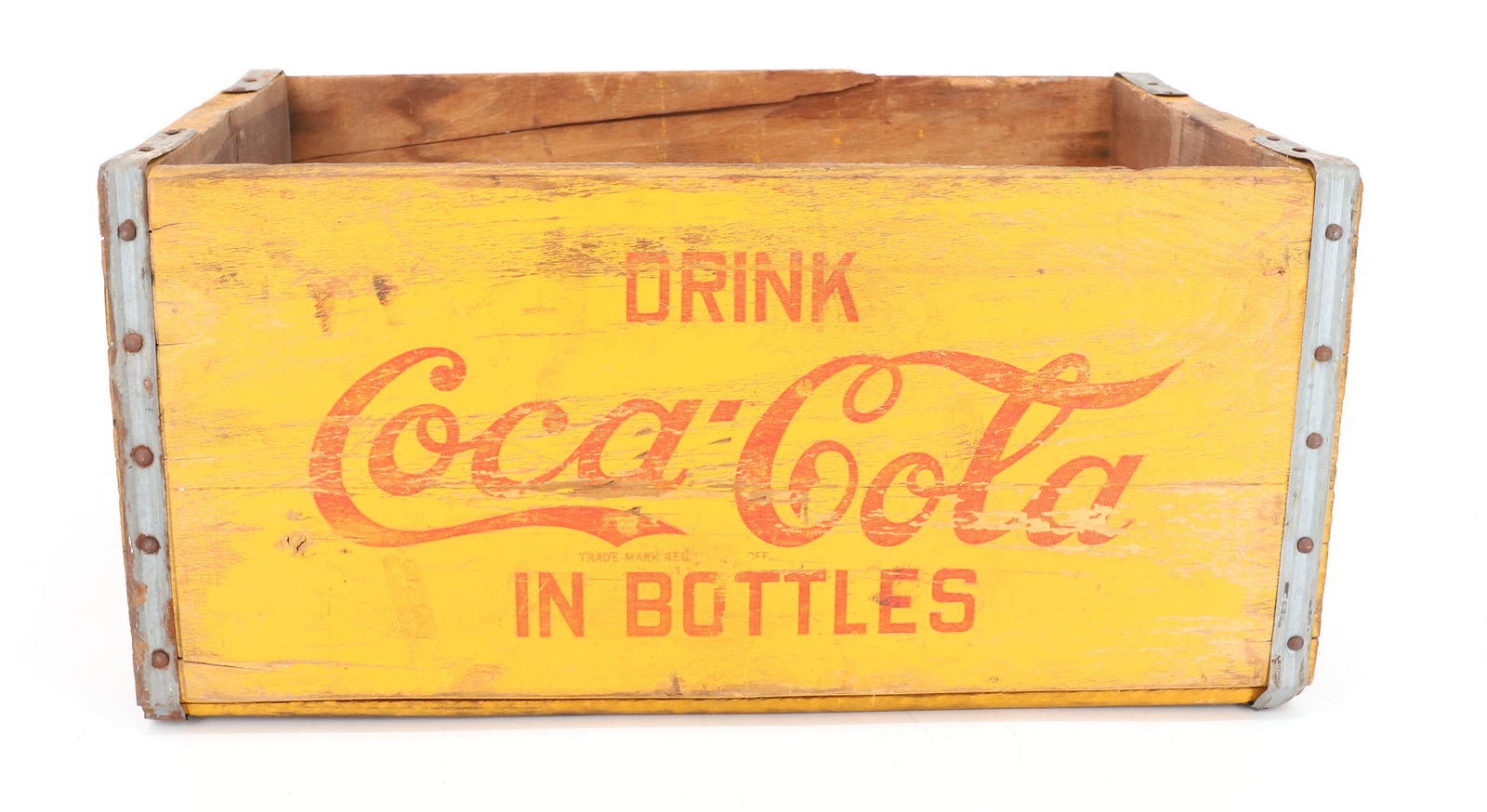 DRINK COCA-COLA IN BOTTLES ADVERTISING CRATE: YELLOW / RED PAINTED EXTERIOR. "COCA-COLA BOTTLING CO. NEW YORK, NY" INTERIOR. 17 1/4" L. PLEASE READ CAREFULLY - Terms for Purchasing and Shipping of Auction Items. Please read carefully before biddi