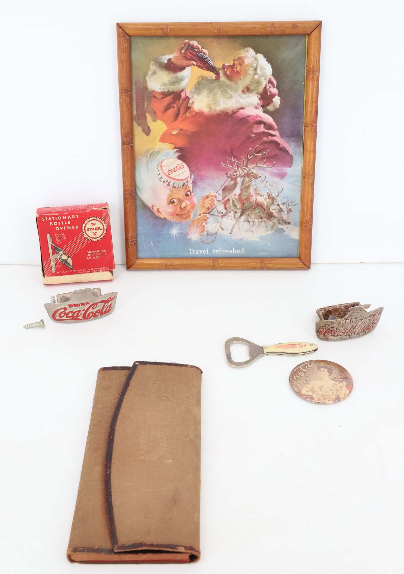 LOT OF COCA-COLA ADVERTISING: INCLUDING: TWO OPENERS (ONE IN BOX), OPENER W/ POCKET KNIFE IN HANDLE, FRAMED ADVERTISEMENT AND MORE. PLEASE READ CAREFULLY - Terms for Purchasing and Shipping of Auction Items. Please read carefully 