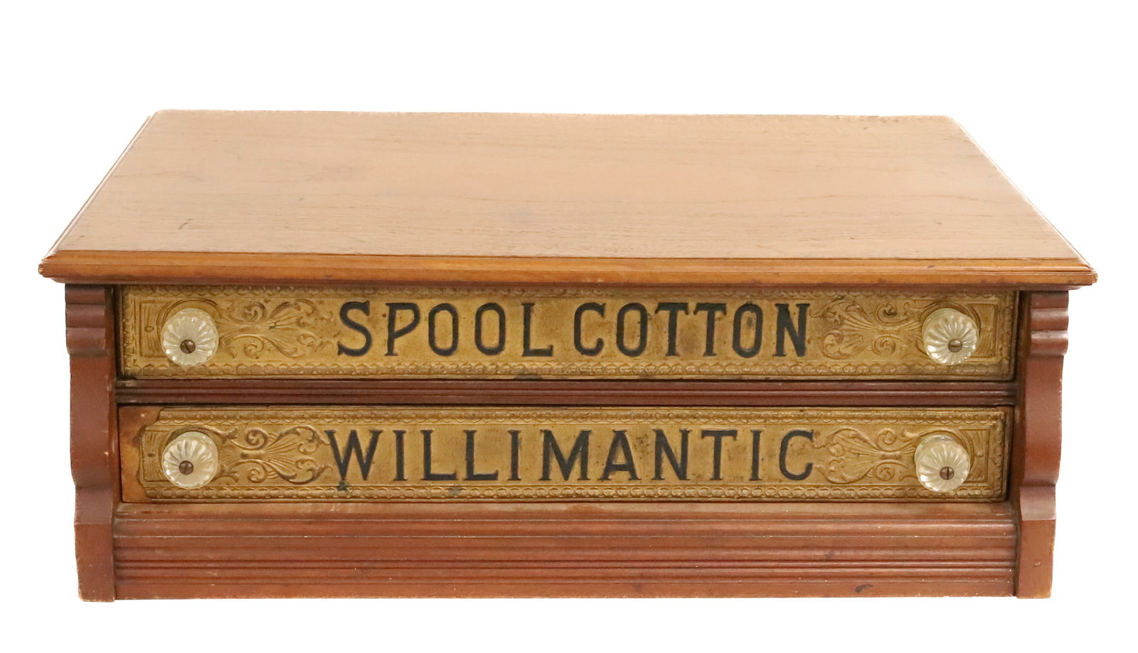 ANTIQUE "WILLIMANTIC" SPOOL CABINET: TWO-DRAWER WITH PRESSED PAINTED METAL DRAWER FRONTS, SIDES AND BACK. 8 1/2" X 23 1/2" X 16 1/2". PLEASE READ CAREFULLY - Terms for Purchasing and Shipping of Auction Items. Please read carefully befor