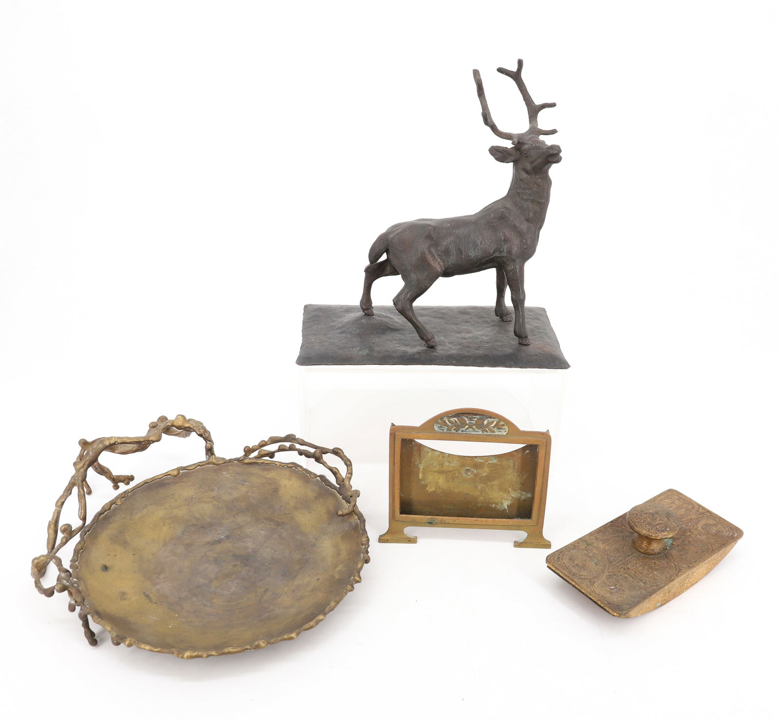 TIFFANY STUDIOS BLOTTER, BRASS BOWL AND MORE: ROCKER BLOTTER IN "ZODIAC" PATTERN MRKD. ON SIDE "TIFFANY STUDIOS, NEW YORK 990" ROUND BRASS BOWL WITH ORGANIC BRASS WORK ON EDGE AND SIDE. 10 1/4" D. BRASS DESK CALENDAR HOLDER AND BRONZE-FINISH COPP