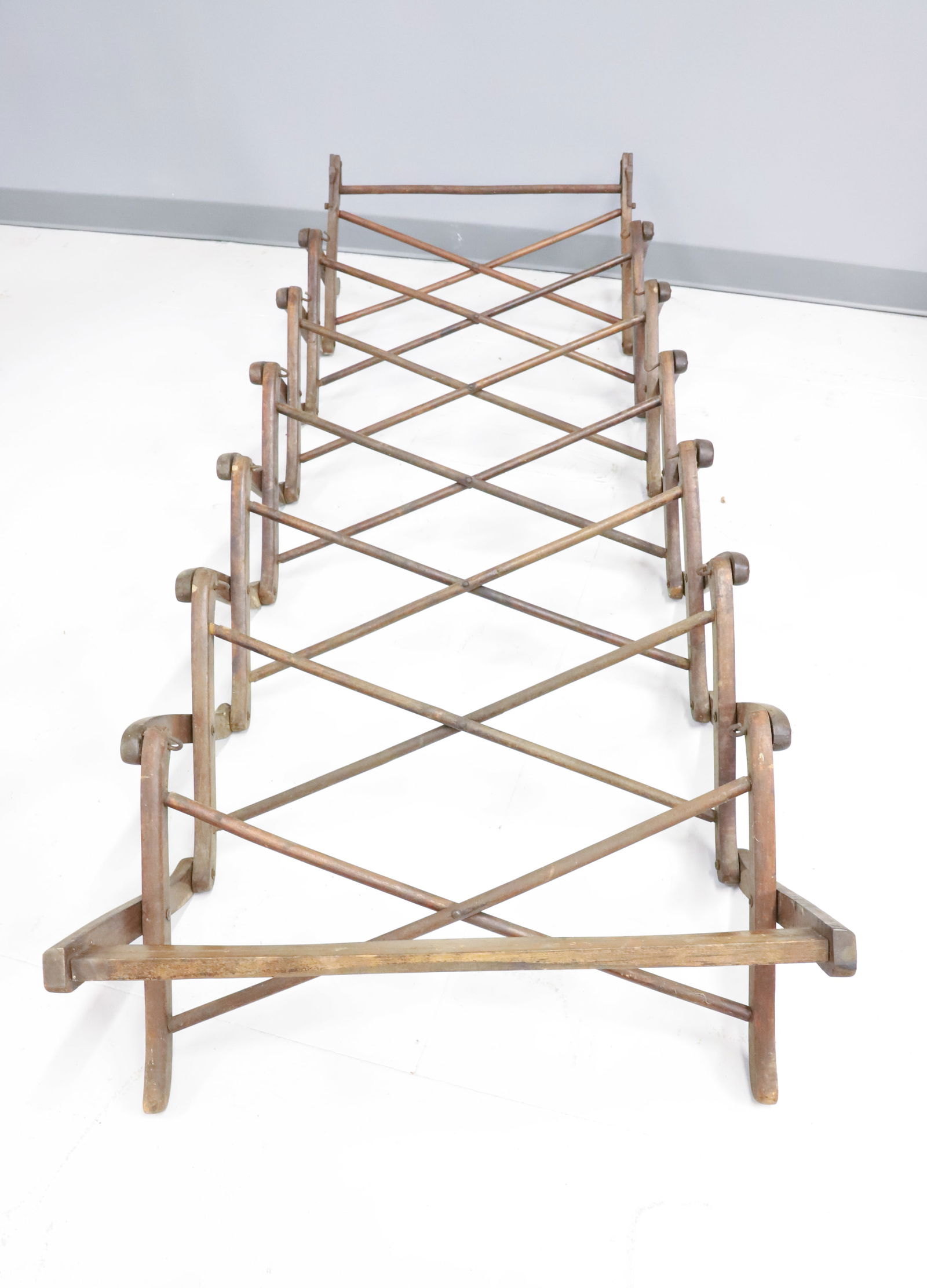WOODEN FOLDABLE BED FRAME: WOOD WITH IRON HOOKS 72" X 29 1/2. COLLAPSED 29 1/2" X 16" X 17 1/2". PLEASE READ CAREFULLY - Terms for Purchasing and Shipping of Auction Items. Please read carefully before bidding. Hartzell’s