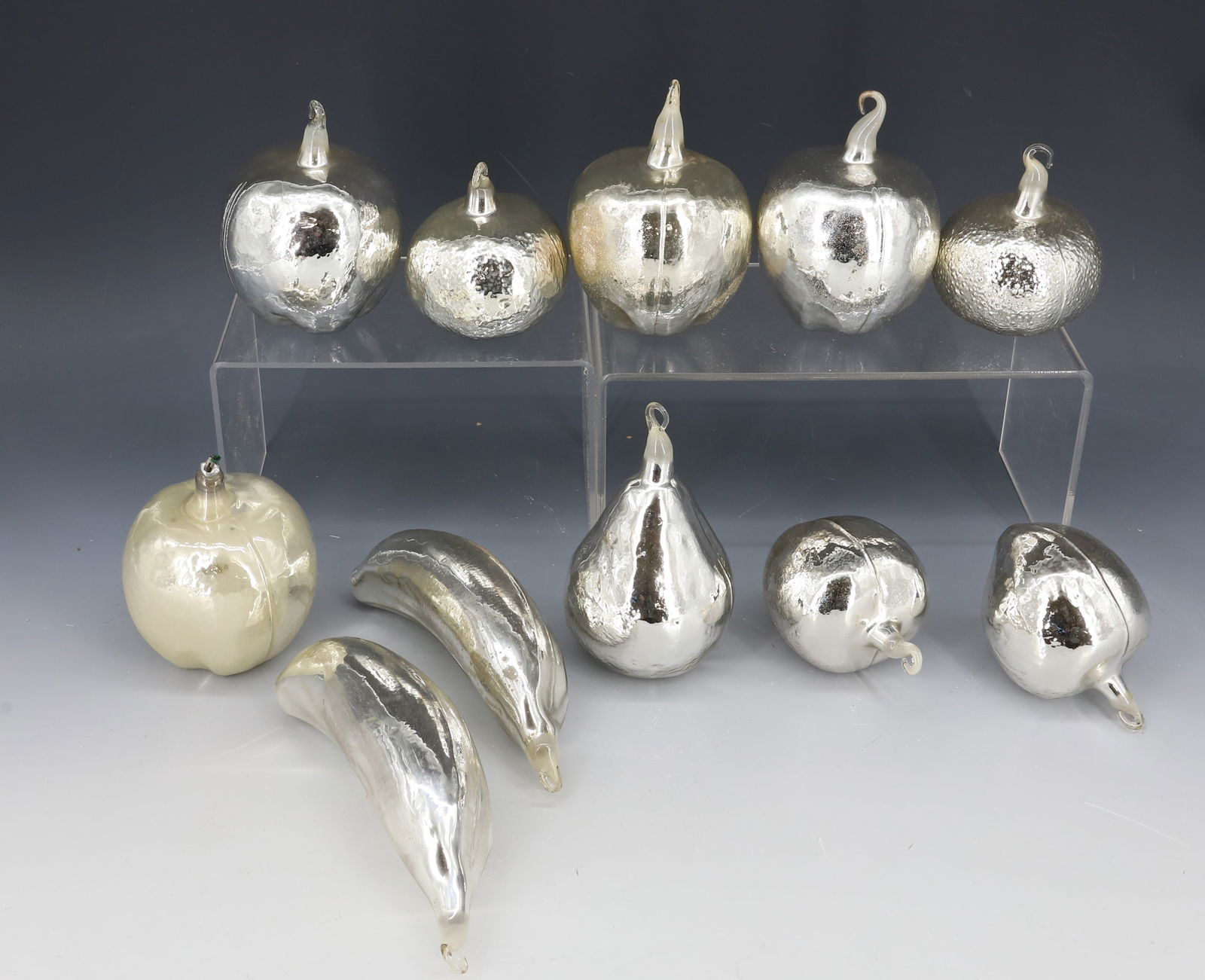 LOT OF VINTAGE GLASS CHRISTMAS ORNAMENTS: SILVER MERCURY BLOWN GLASS FRUIT ORNAMENTS. LARGEST 6 1/4" L. PLEASE READ CAREFULLY - Terms for Purchasing and Shipping of Auction Items. Please read carefully before bidding. Hartzell’s Auction