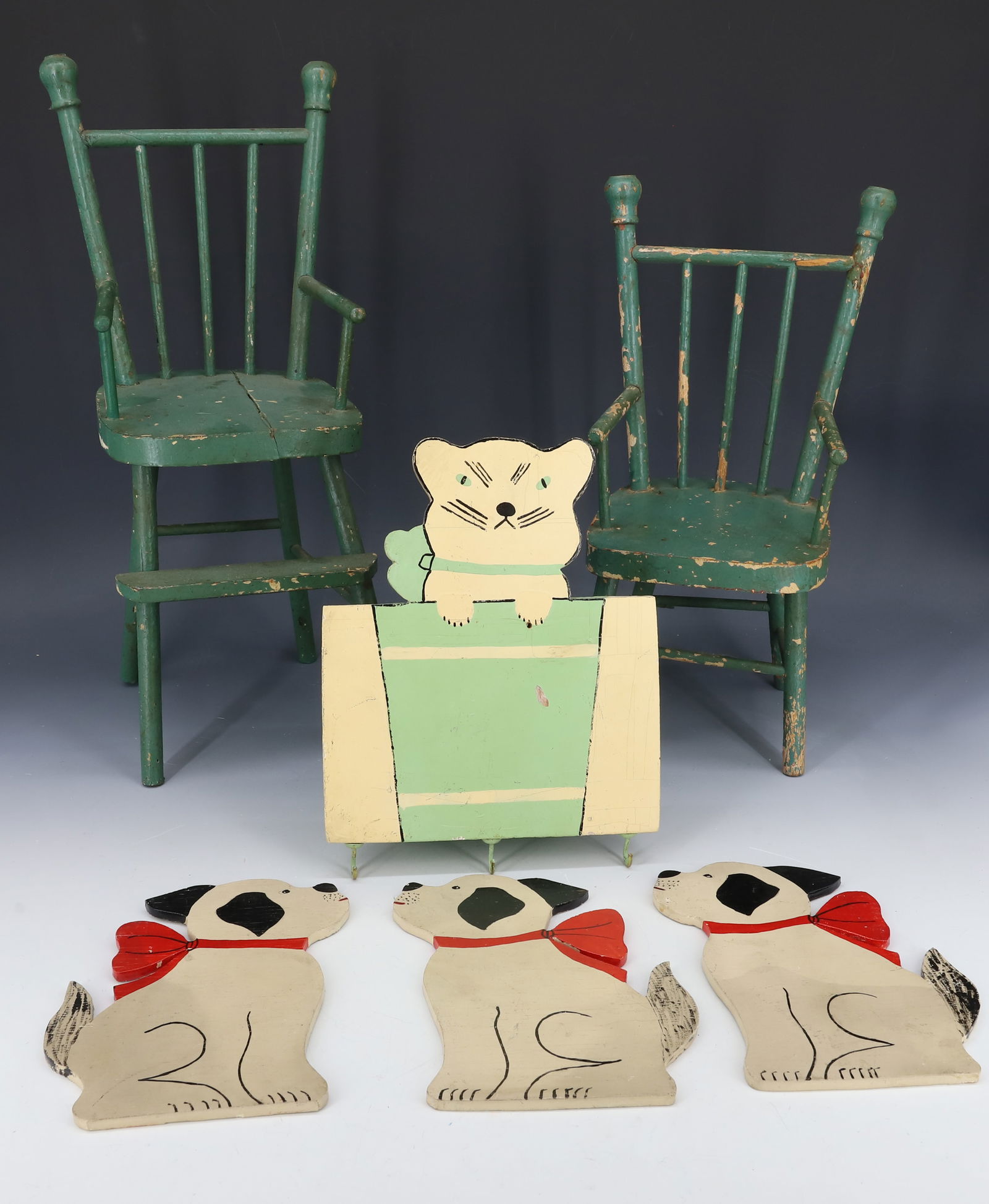 DOLL CHAIRS, WOOD DOG / CAT CUT-OUTS: TWO GREEN PAINTED DOLL CHAIRS 12 1/2" AND 15" HEIGHTS. PAINTED CAT BOX WITH THREE HOOKS BELOW. PLUS, THREE DOG CUT-OUTS 6 3/4" H. PLEASE READ CAREFULLY - Terms for Purchasing and Shipping of Auction I