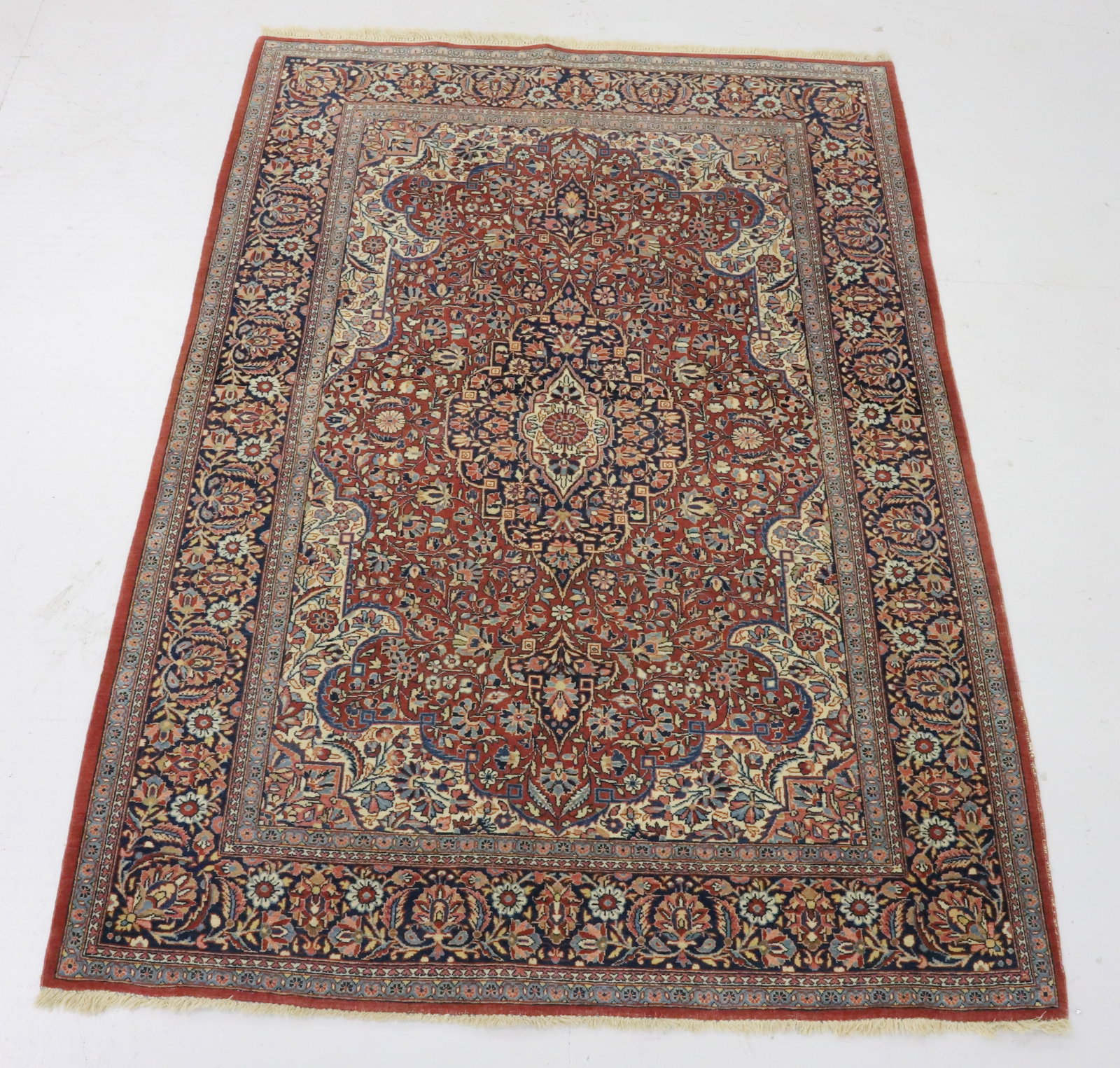 VINTAGE ORIENTAL RUG: MAUVE / BLUE / CREAM / TAN INTRICATELY DESIGNED FLORAL RUG WITH CENTER MEDALLION AND MULTIPLE BORDERS. FRINGE EDGES. 79 1/2" X 56". PLEASE READ CAREFULLY - Terms for Purchasing and Shipping of Auction
