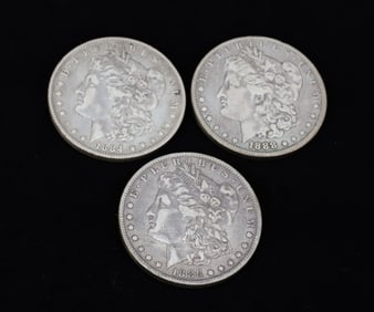 (3) MORGAN DOLLARS