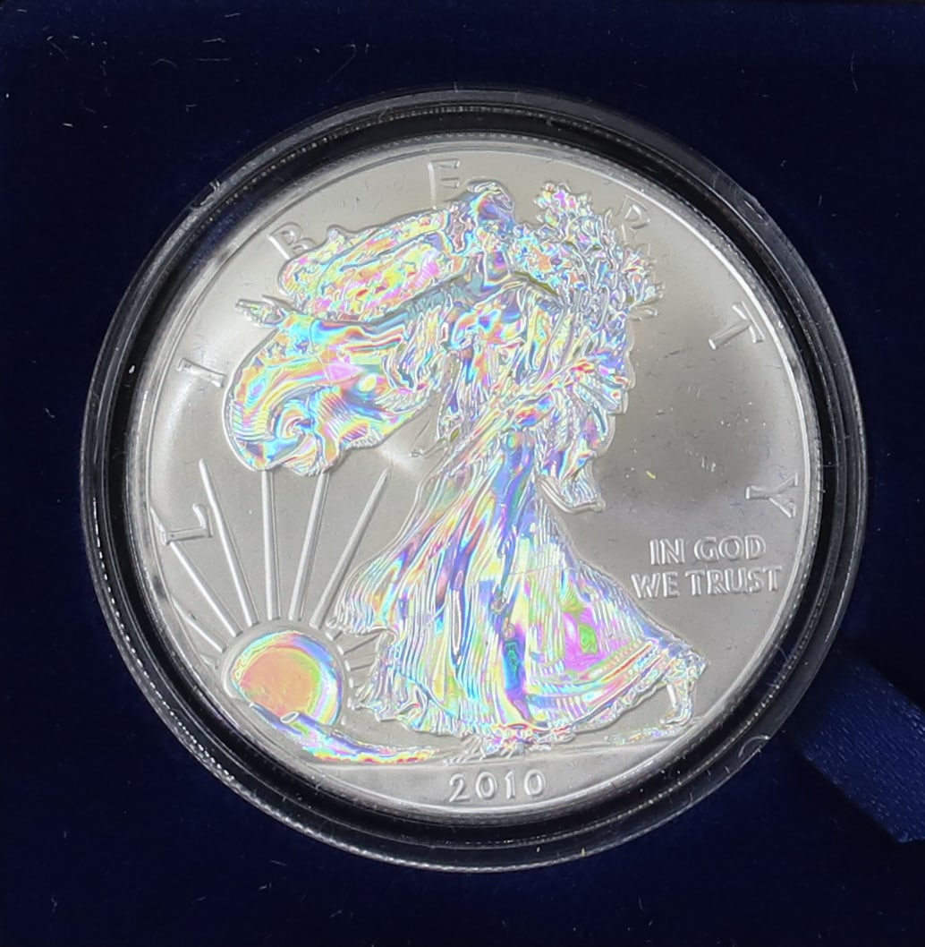 2010 SILVER AMERICAN EAGLE: HOLOGRAPHIC, CAMEO PLEASE READ CAREFULLY - SINCE THIS IS A COIN SALE PLEASE NOTE. ITEMS MUST BE PAID FOR THROUGH LIVE AUCTIONEERS OR WITH CASH OR CHECK IN PERSON - Terms for Purchasing and Shipping of