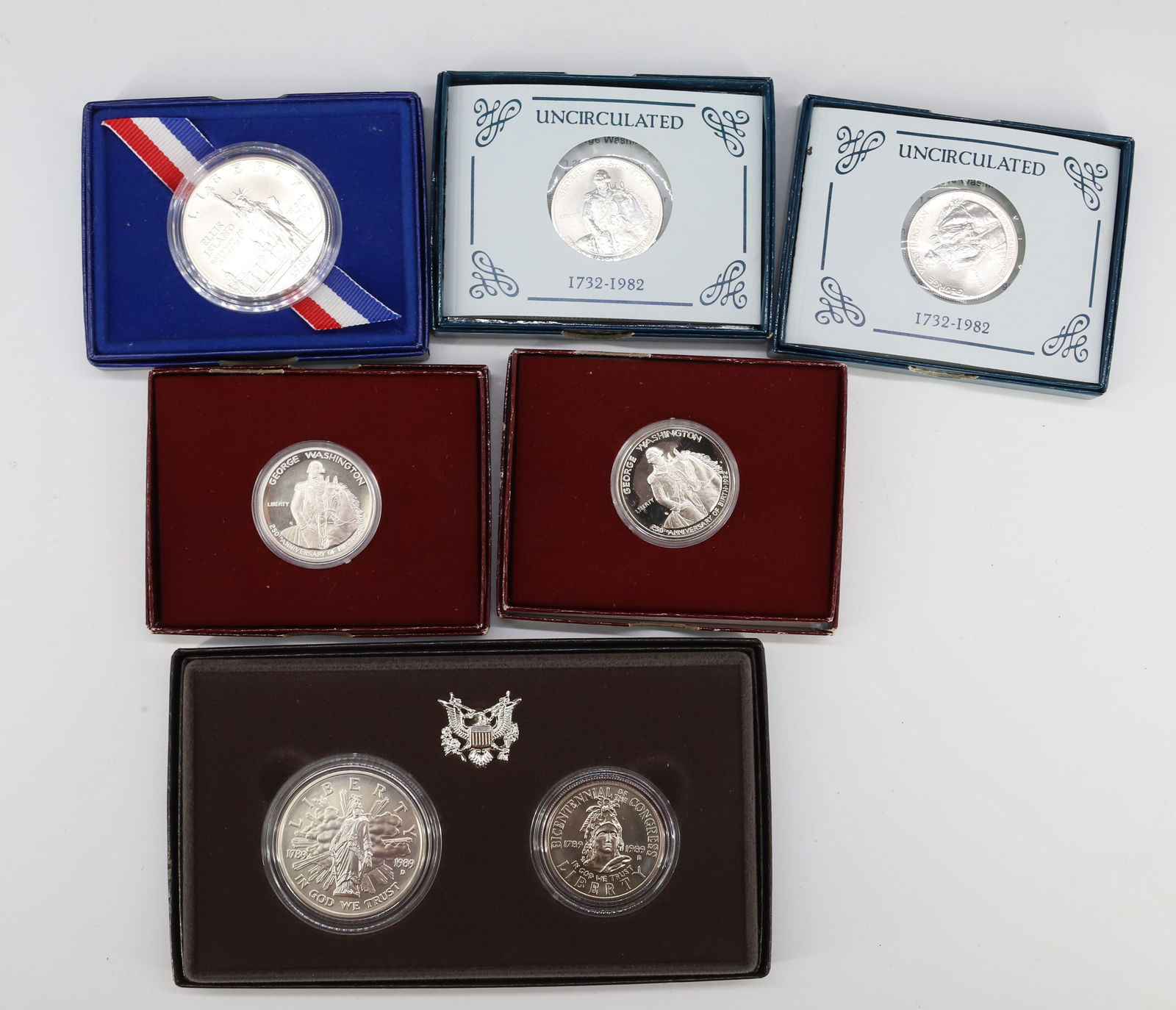 LOT OF (6) COMMEMORATIVE SILVER HALF DOLLARS (1 of 6)