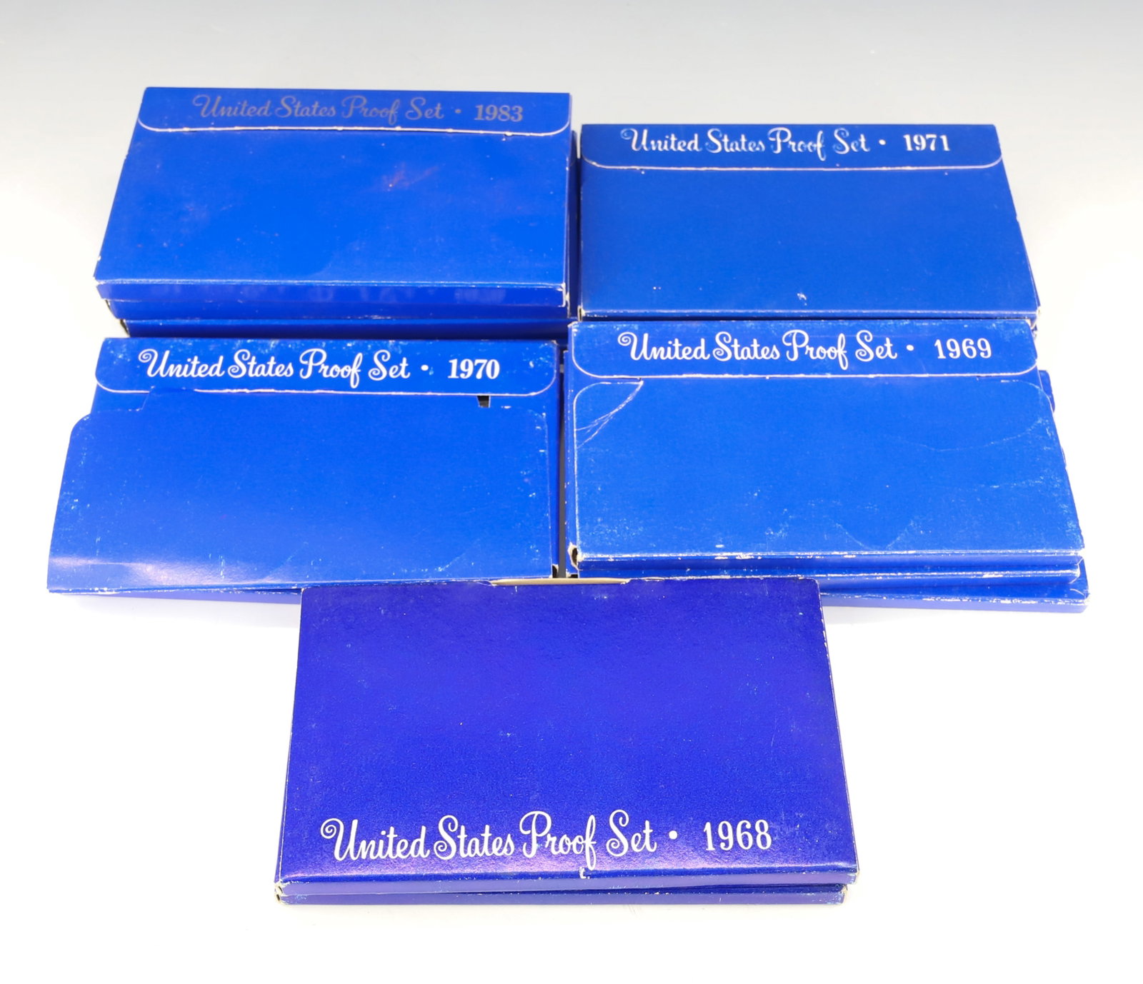 UNITED STATES PROOF SETS: (14) INCLUDING - 1968, 1969, 1970, 1971, AND 1983 PLEASE READ CAREFULLY - SINCE THIS IS A COIN SALE PLEASE NOTE. ITEMS MUST BE PAID FOR THROUGH LIVE AUCTIONEERS OR WITH CASH OR CHECK IN PERSON - Terms