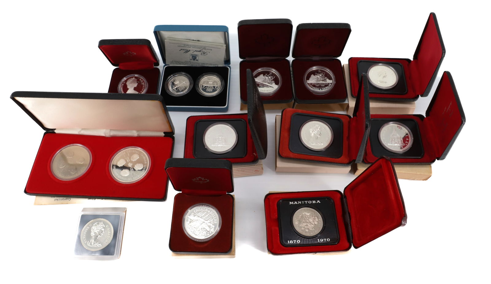 LOT OF SILVER ROYAL CANADIAN MINT DOLLARS (1 of 7)